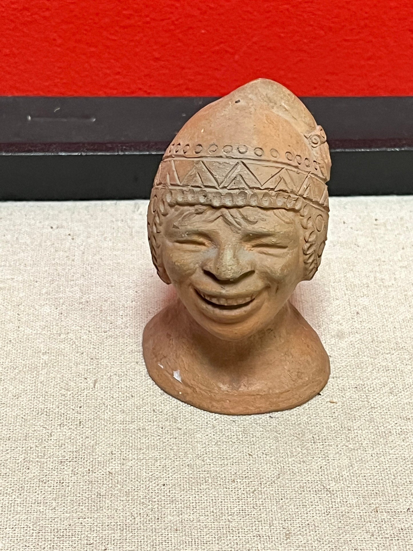 Cool 4 inch high terra-cotta head depicting a mans face   unique gift