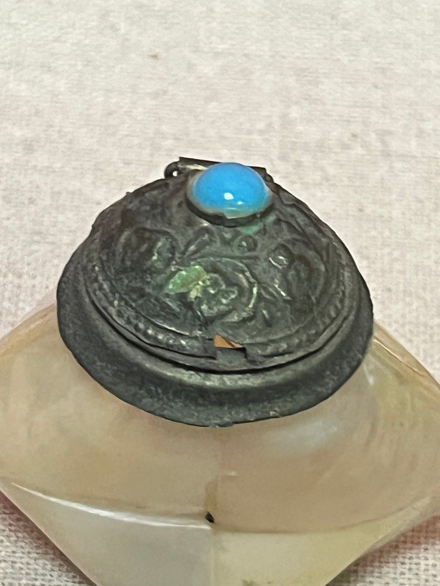 Lovely, 2 inch high shell and bronze bottle  with cartouche  As is  priced accordingly