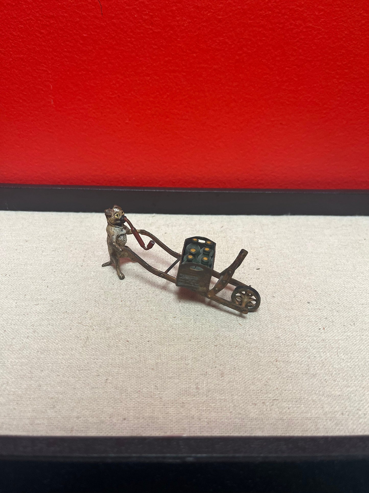 Authentic 4 inch signed rare Franz Bergman call painted Austrian bronze of a pug dog pushing a cart   wow