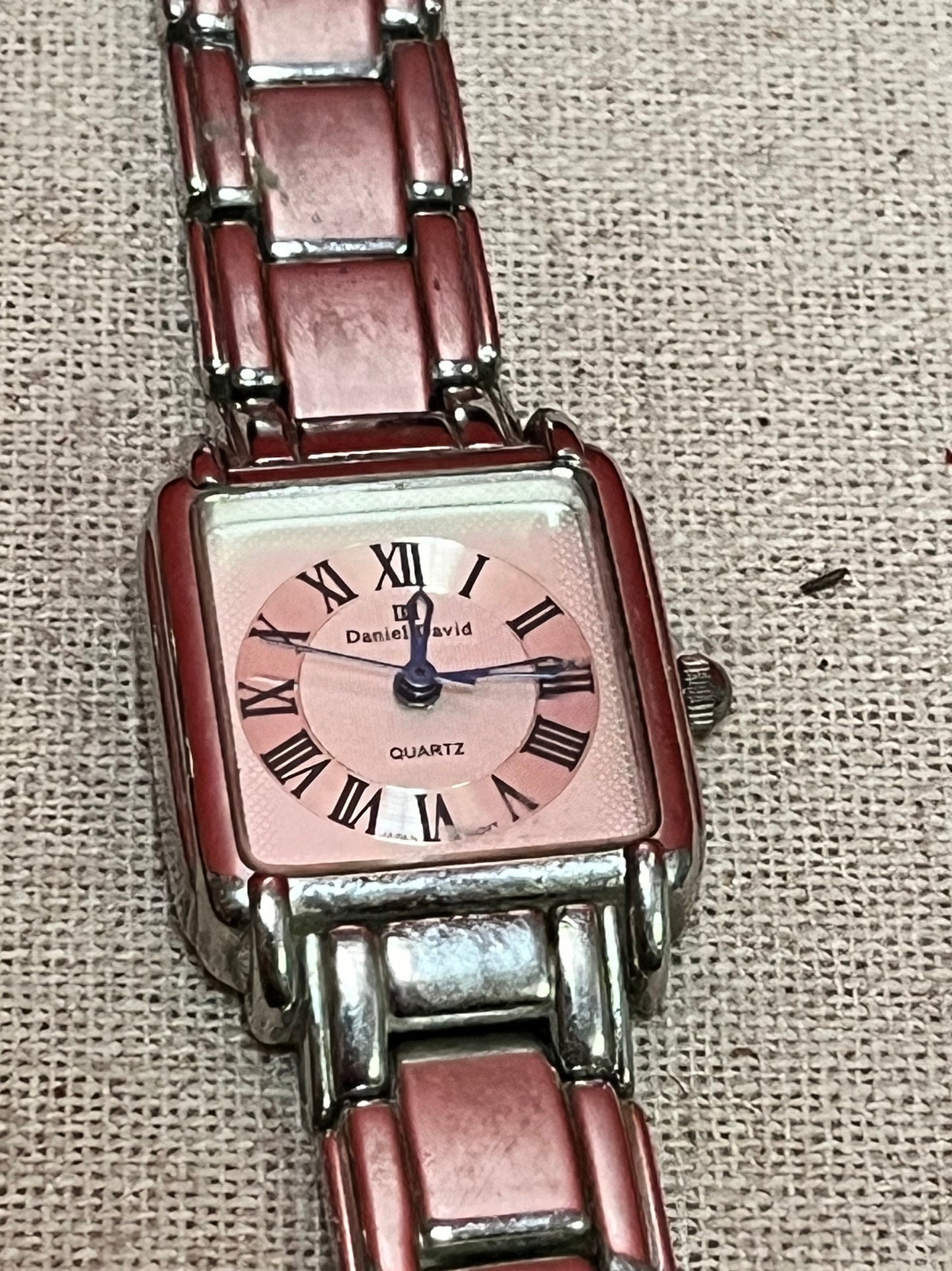 A  Nice lot of three designer watches as is -Great for tinkering or resale