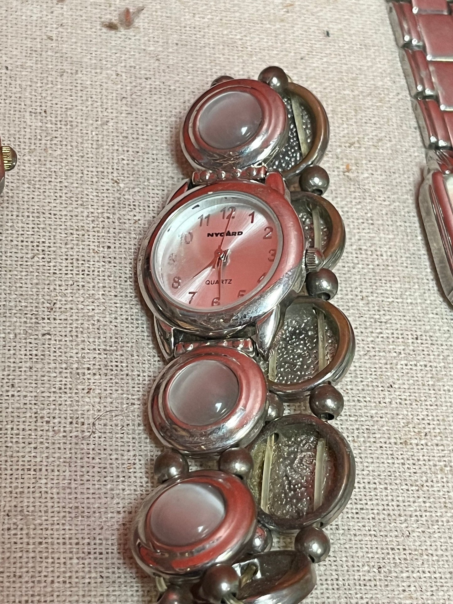 A  Nice lot of three designer watches as is -Great for tinkering or resale