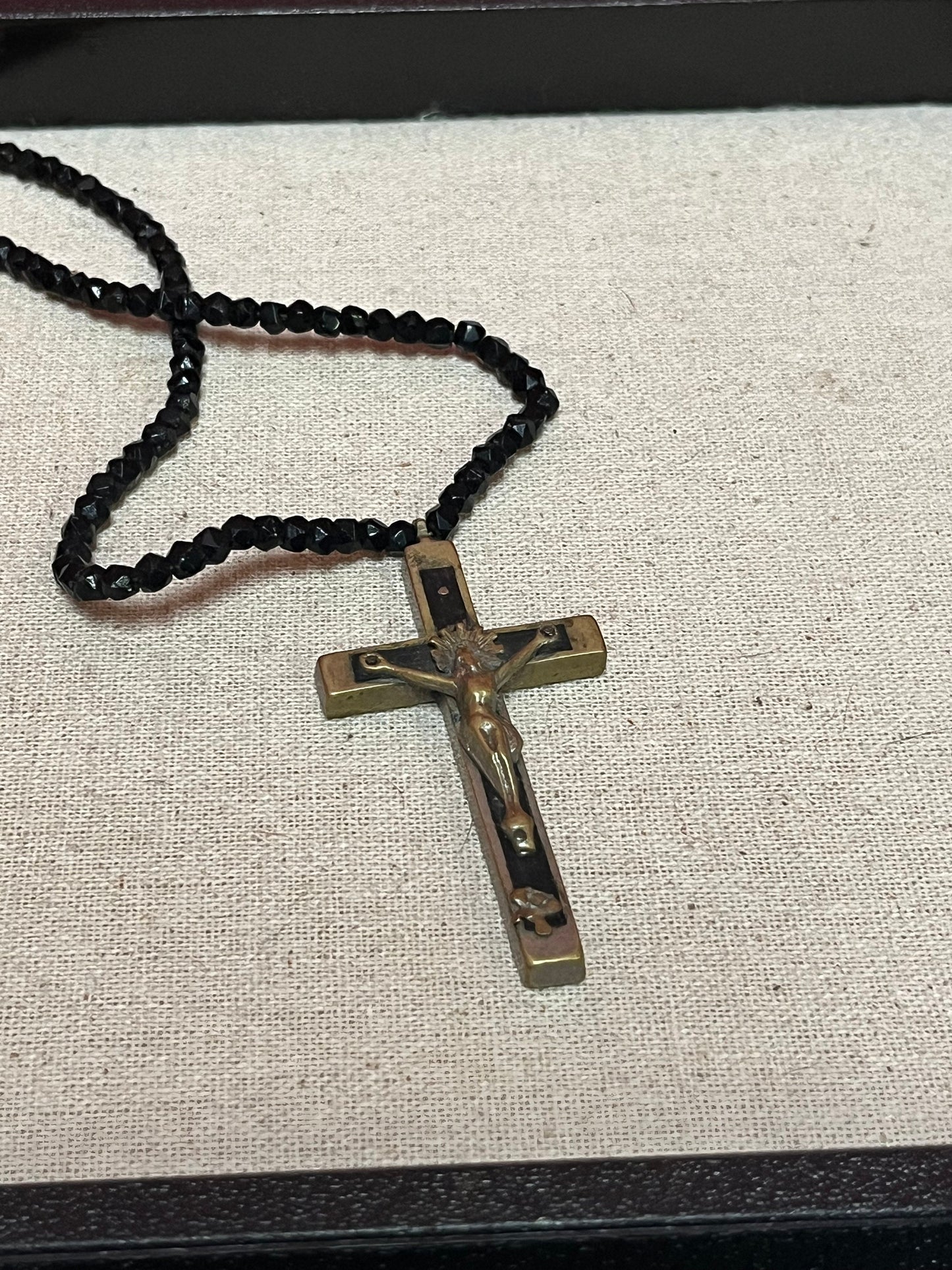 Stunning approximately 25 inch long, jet black beard necklace with a 3 inch long bronze crucifix pendant  very cool