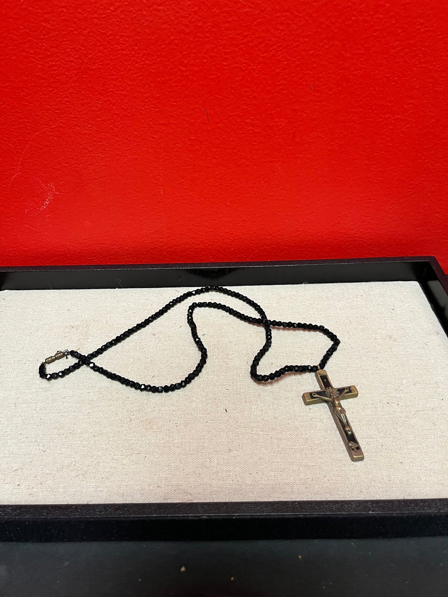 Stunning approximately 25 inch long, jet black beard necklace with a 3 inch long bronze crucifix pendant  very cool