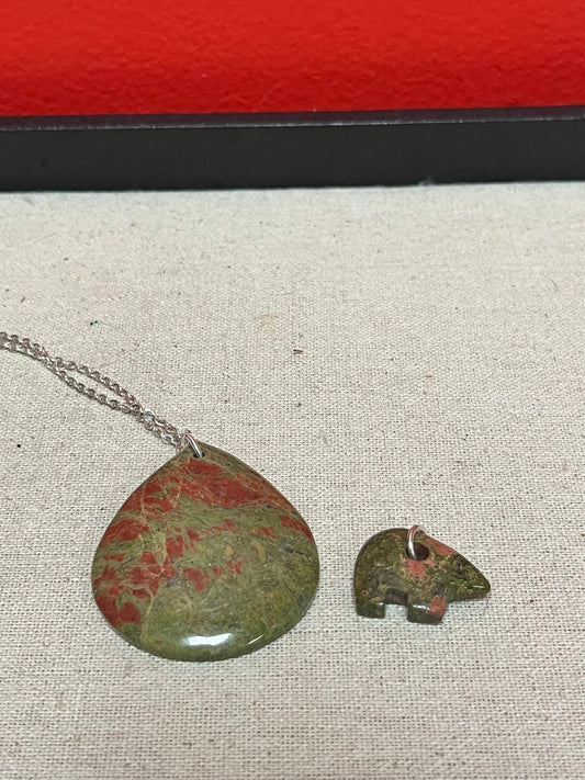 A  Beautiful  unakite pendant with silver necklace and extra bear pendant  pendant is 2 1/2 inches long  great gifts