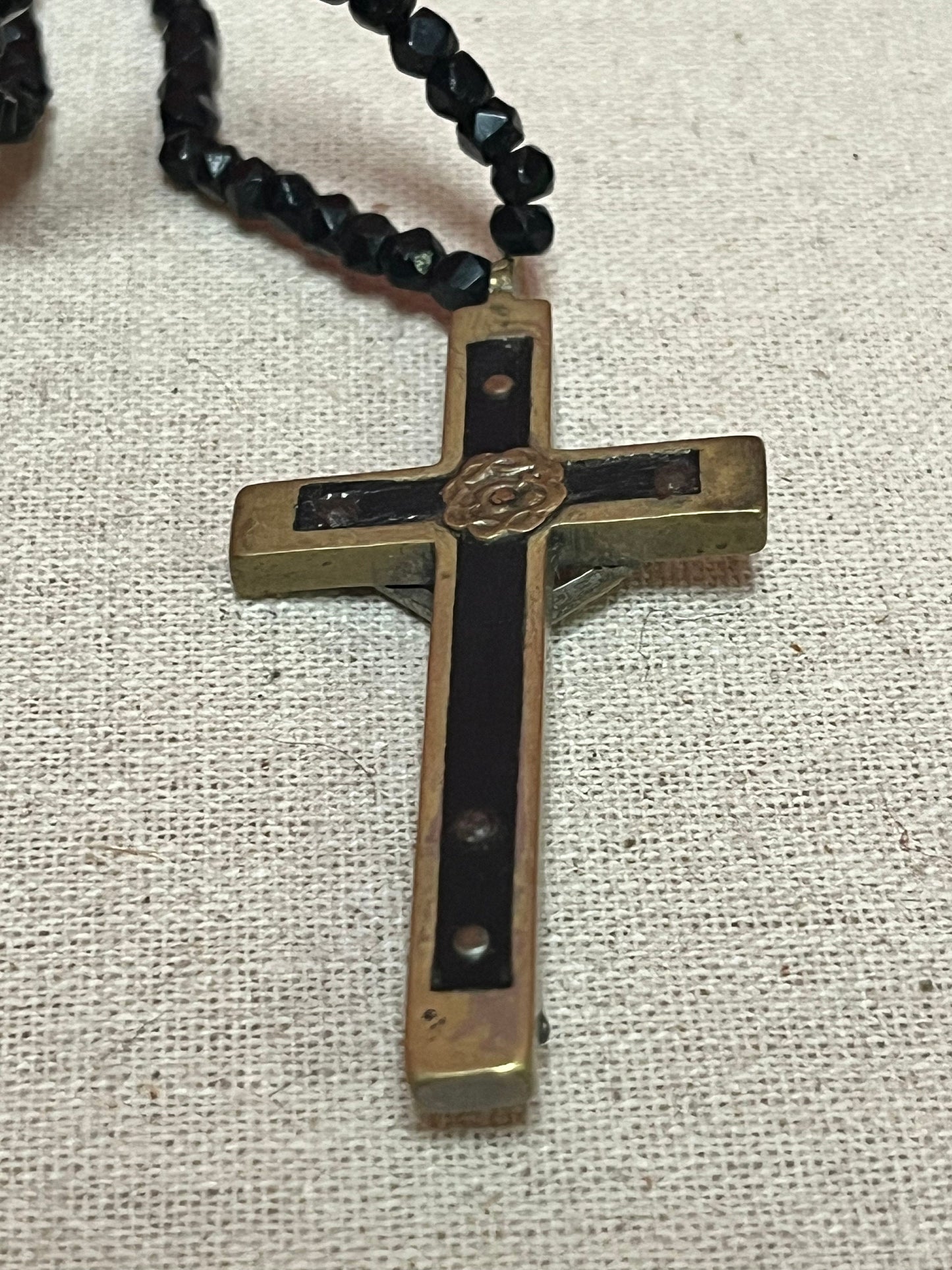 Stunning approximately 25 inch long, jet black beard necklace with a 3 inch long bronze crucifix pendant  very cool