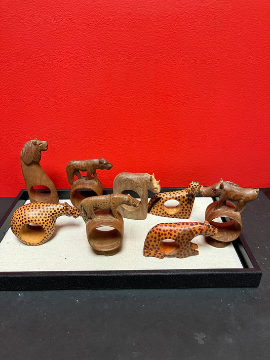 Wonderful lot of African wood napkin ring holders    8 pieces  approximately 4 inches each  great price for all