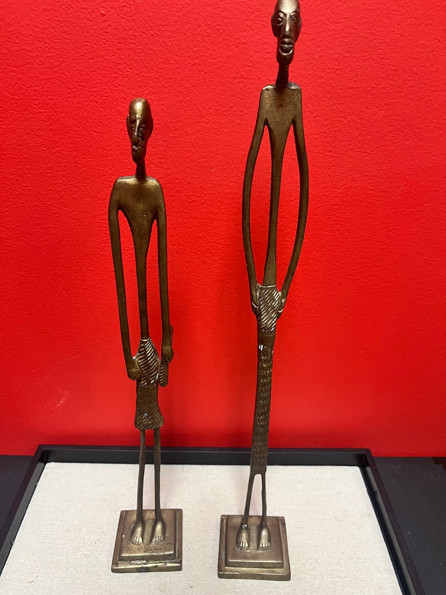 A  Pair of Stunning African bronze statues  Benin style  patina is great  super gifts  15 and 17 inches tall