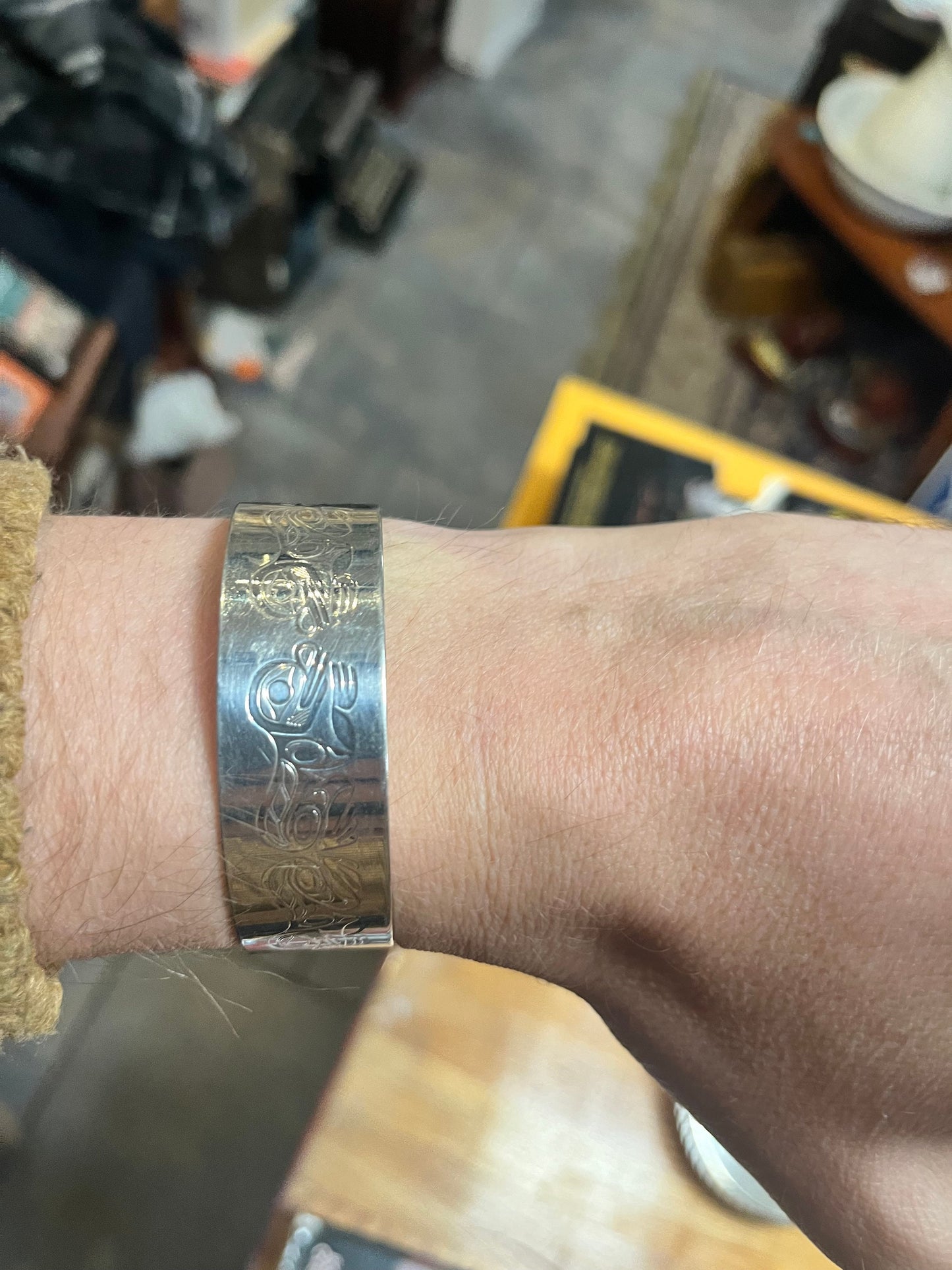 Absolutely stunning 2.25 inch wide indigenous first nation specific north west coast signed silver bracelet bangle with great imagery