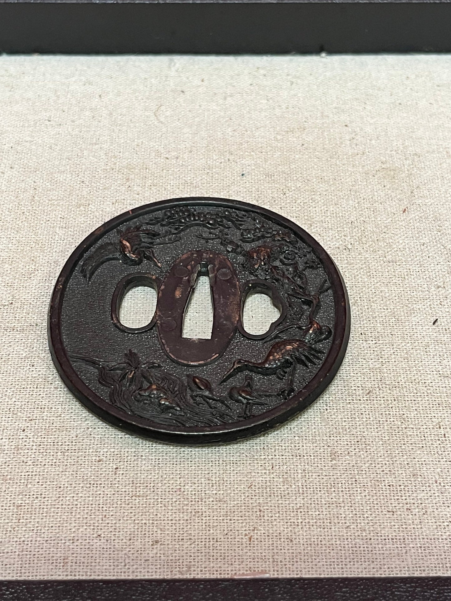 Lovely Japanese 3 inch bronze samurai tsuba depicting storks  unique imagery