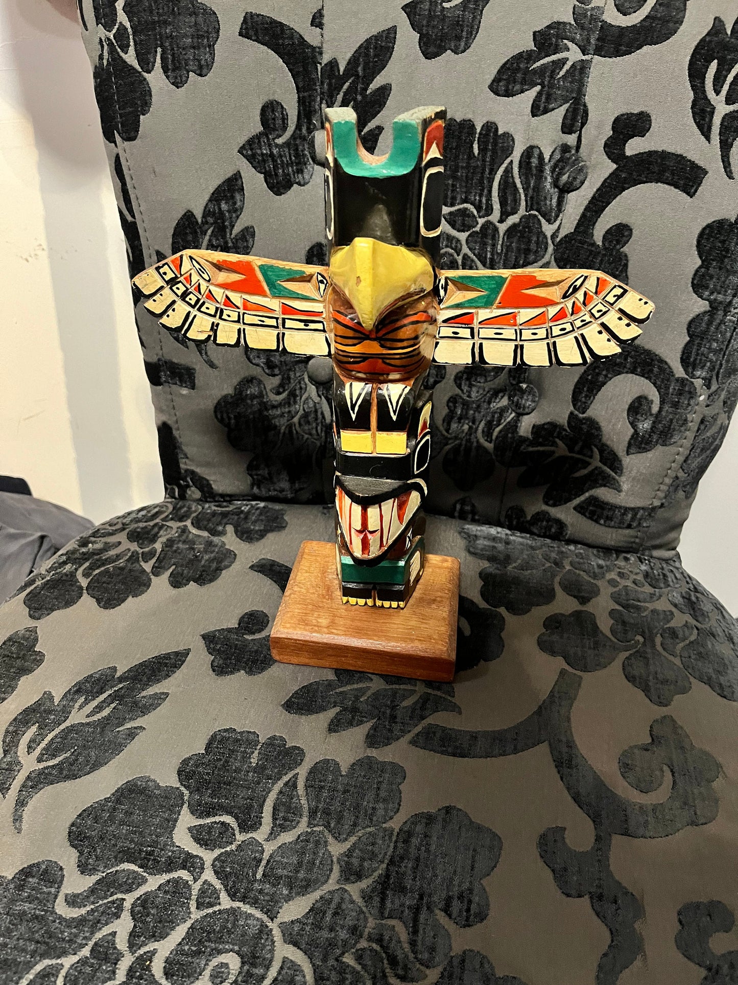 A  11 inch indigenous First Nations polychrome  Totem pole with wings  great look and derail