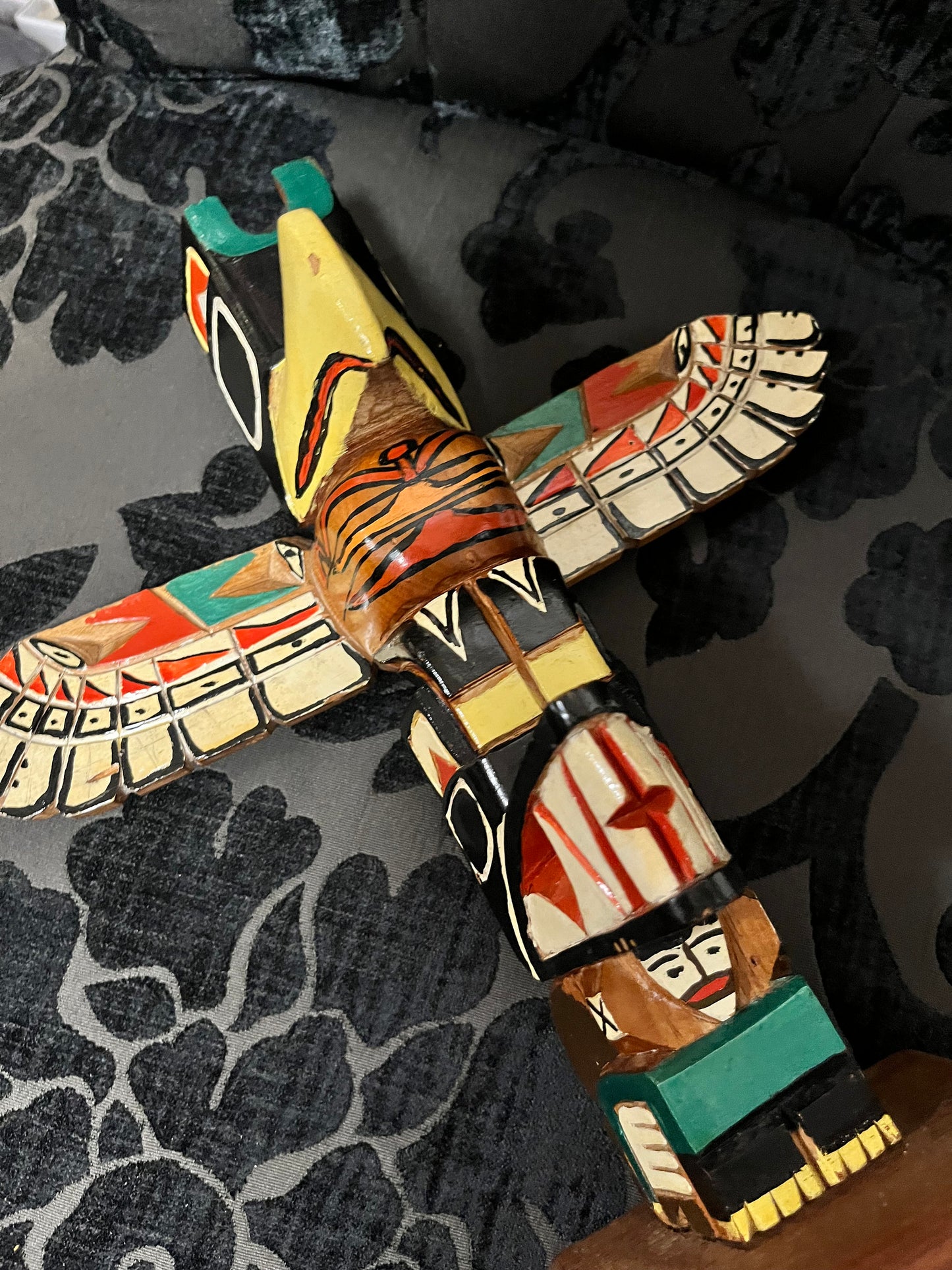 A  11 inch indigenous First Nations polychrome  Totem pole with wings  great look and derail