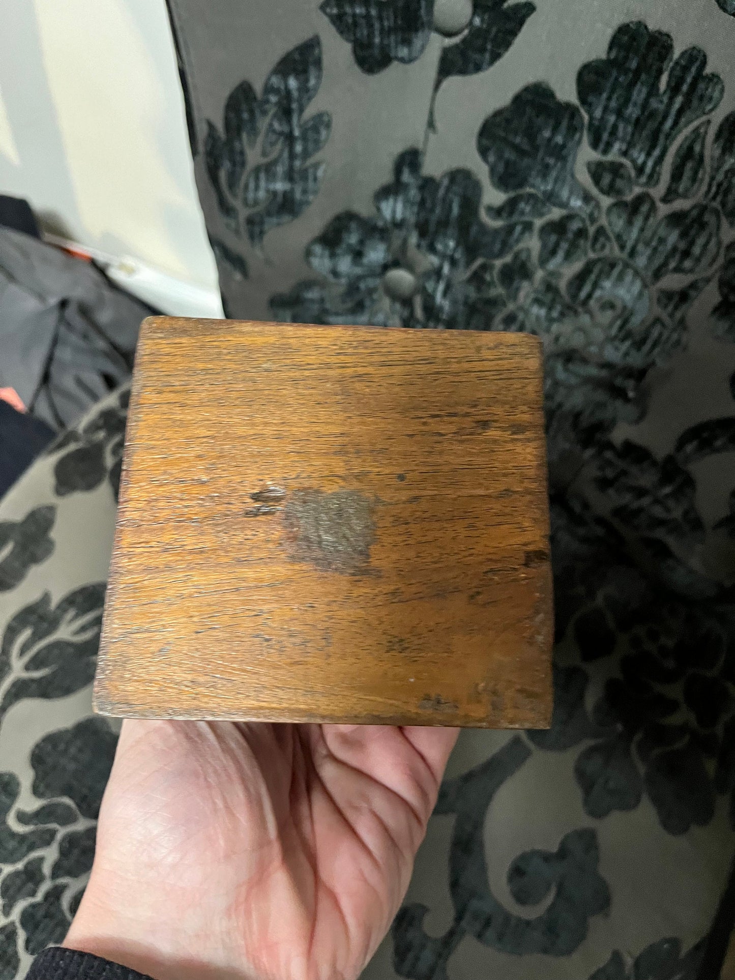 A 11 inch south east wooden statue  stand or hang