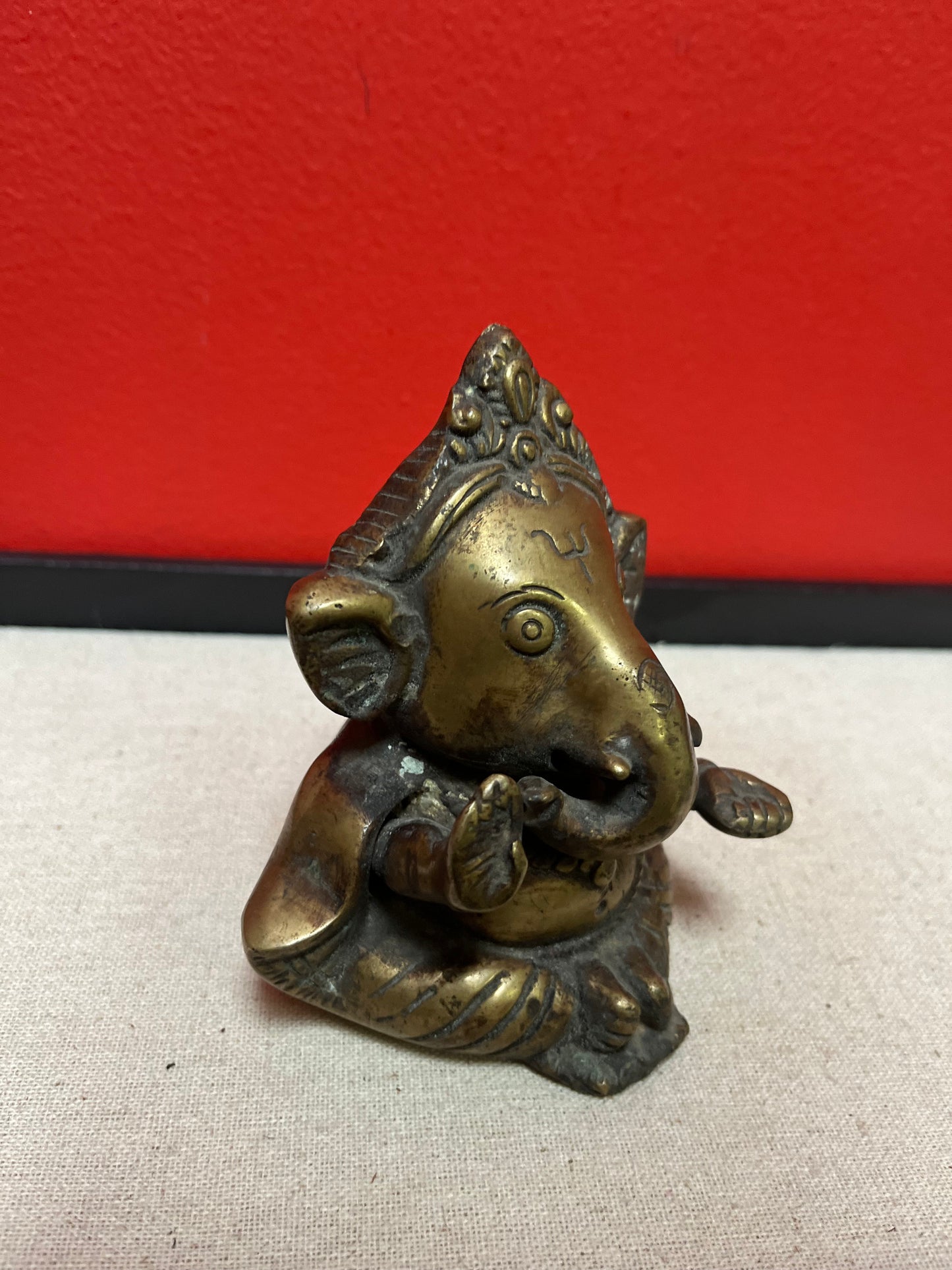 Solid bronze 5 inch high Indian Ganesh stature  great patina and very heavy