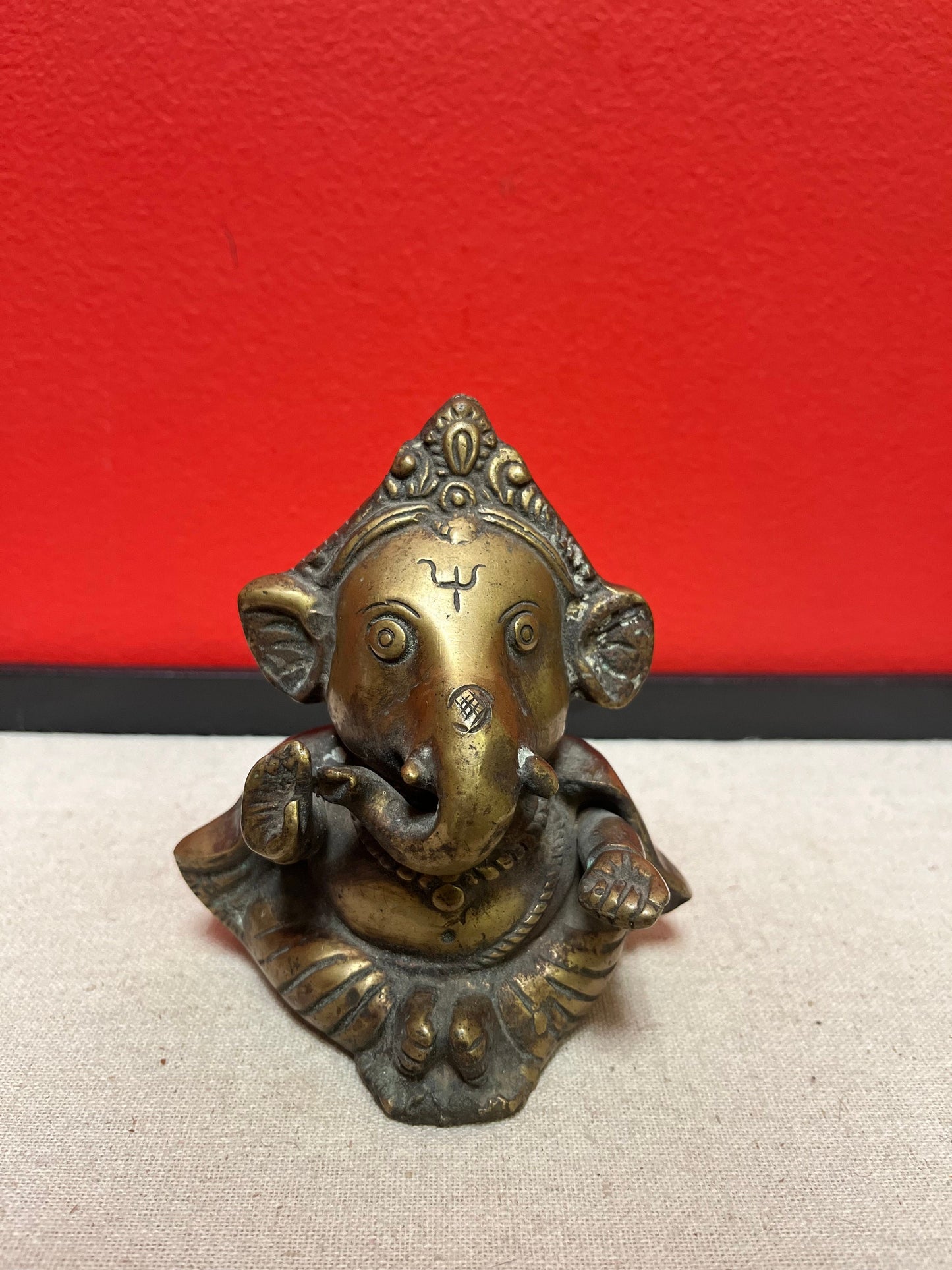 Solid bronze 5 inch high Indian Ganesh stature  great patina and very heavy
