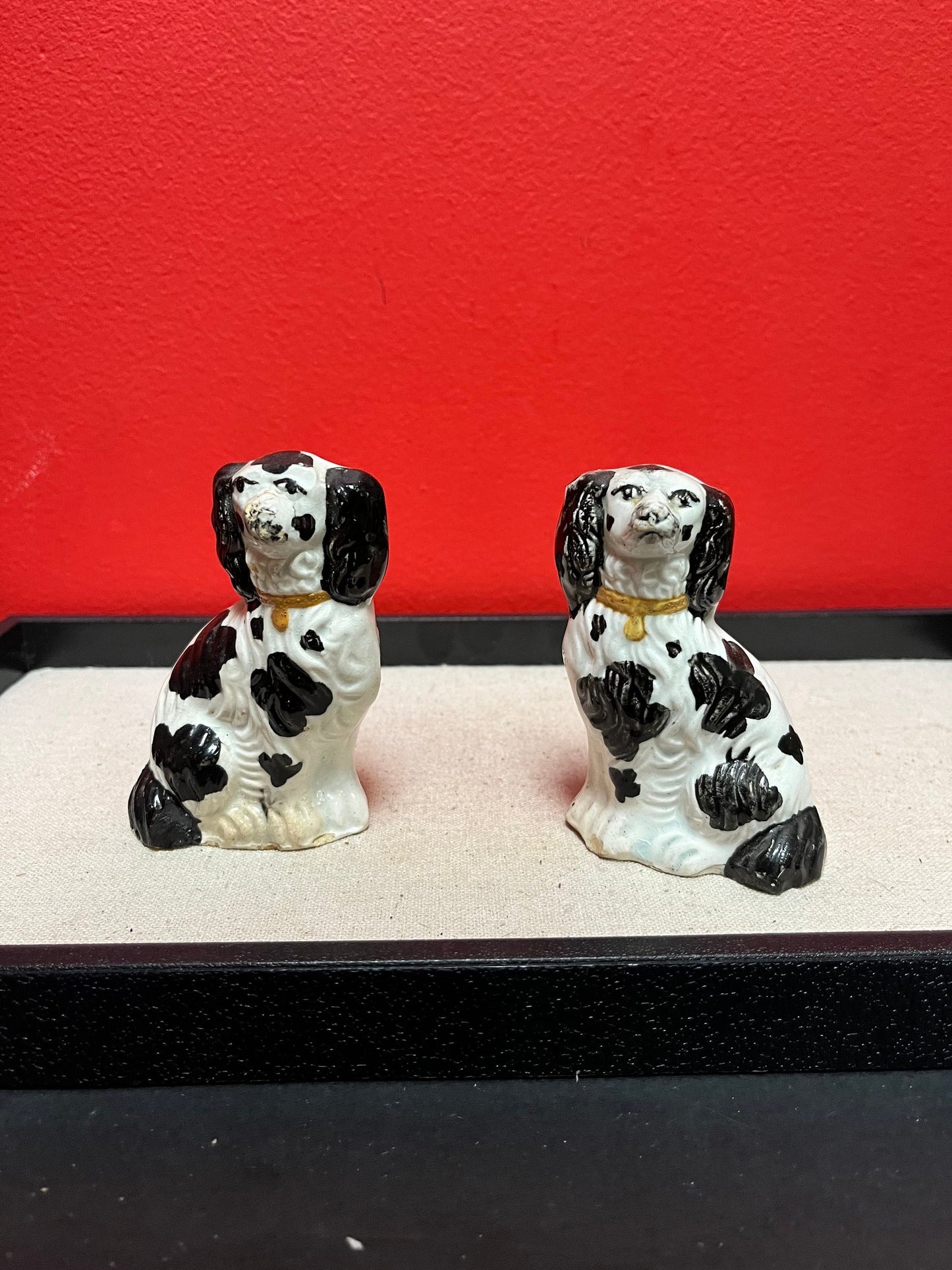 Lovely pair of 19 century Staffordshire spaniels  4 inches high, and in less than perfect condition