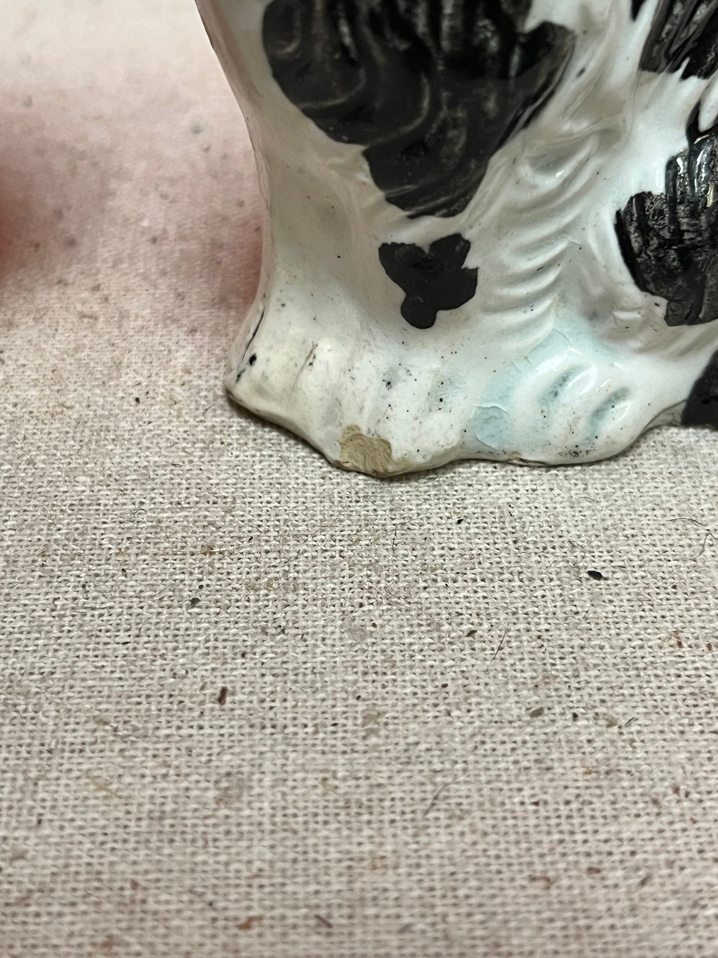 Lovely pair of 19 century Staffordshire spaniels  4 inches high, and in less than perfect condition