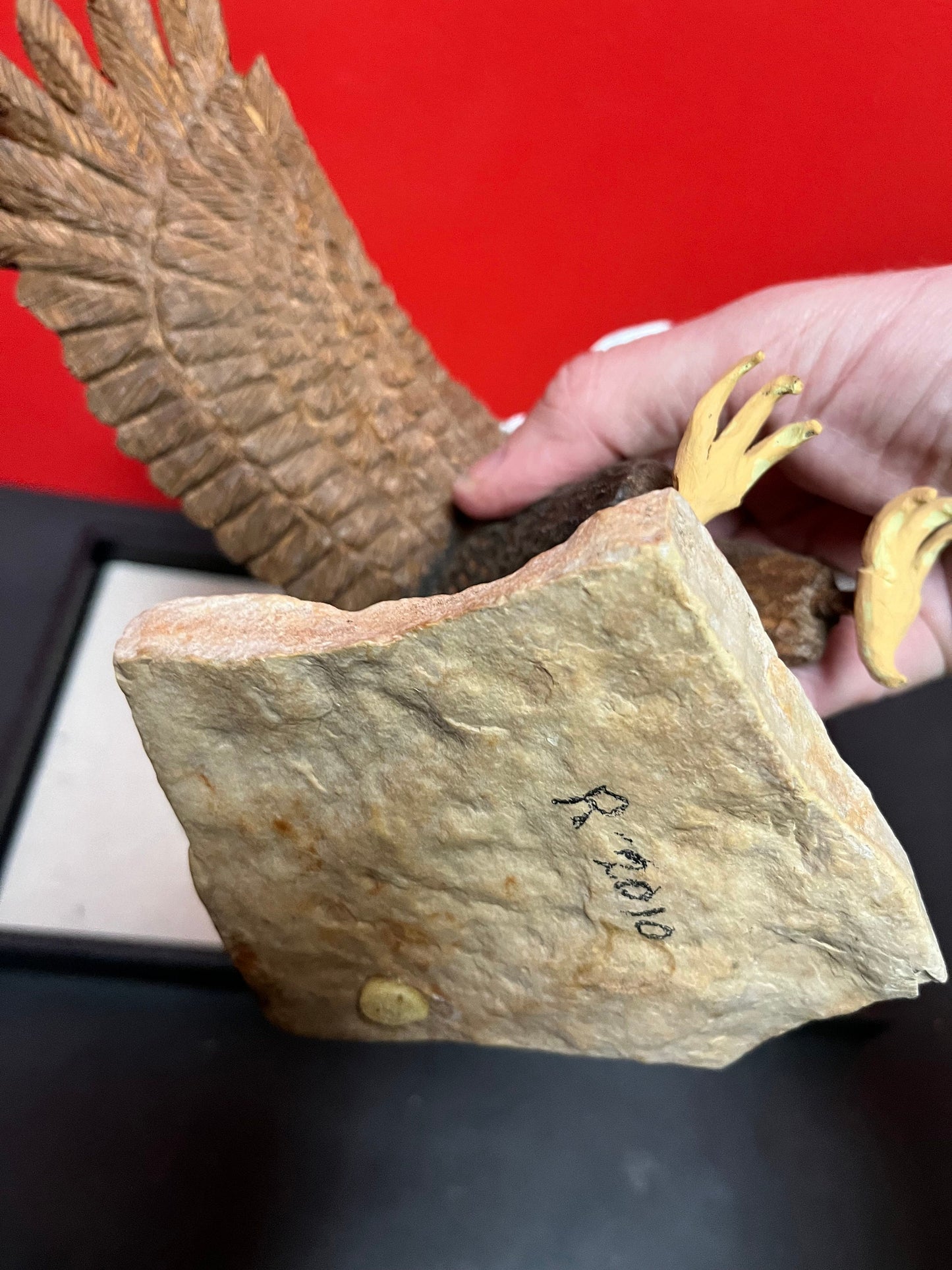 A  Lovely hand carved 11 x 11“ eagle on rock stand with salmon prey