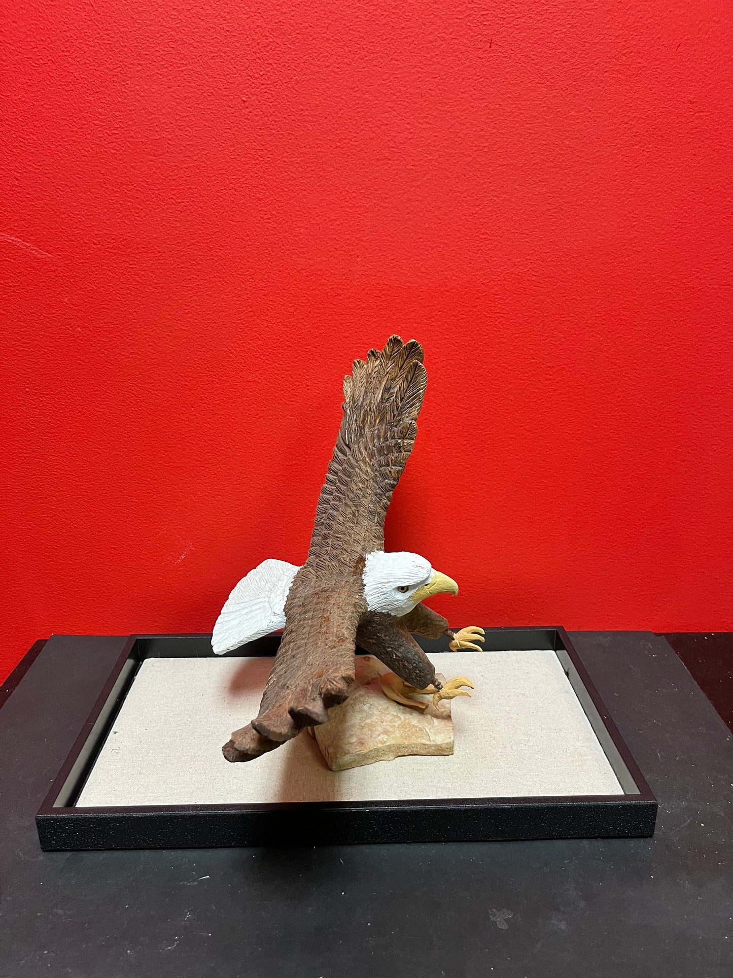 A  Lovely hand carved 11 x 11“ eagle on rock stand with salmon prey