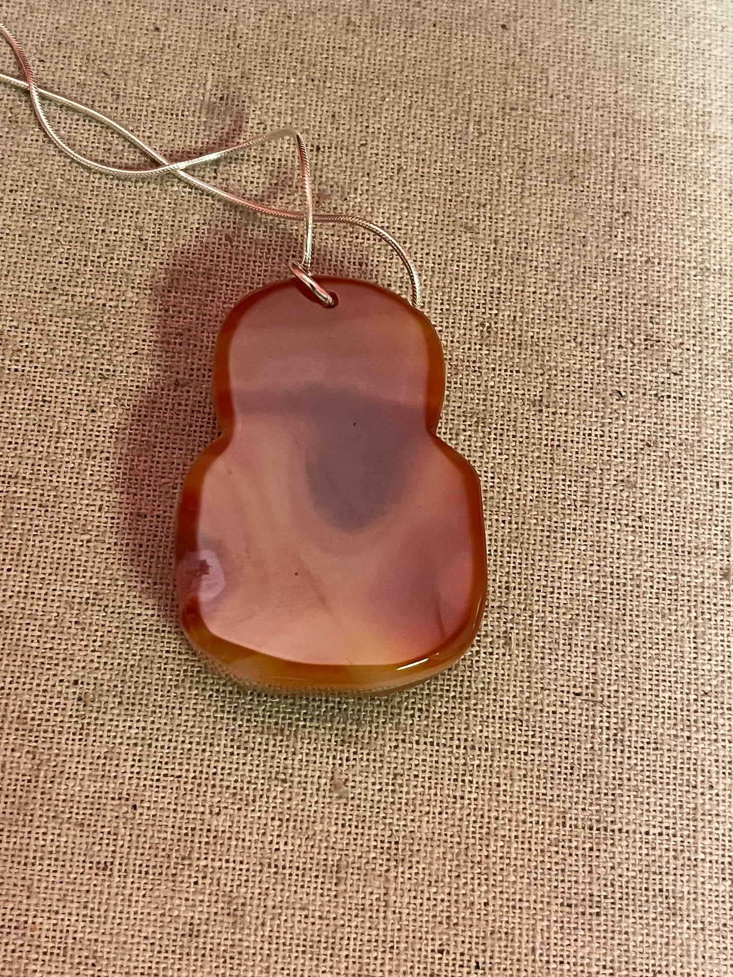 Fabulous 2 inch long chameleon agate pendant depicting Confucius with a free silver chain