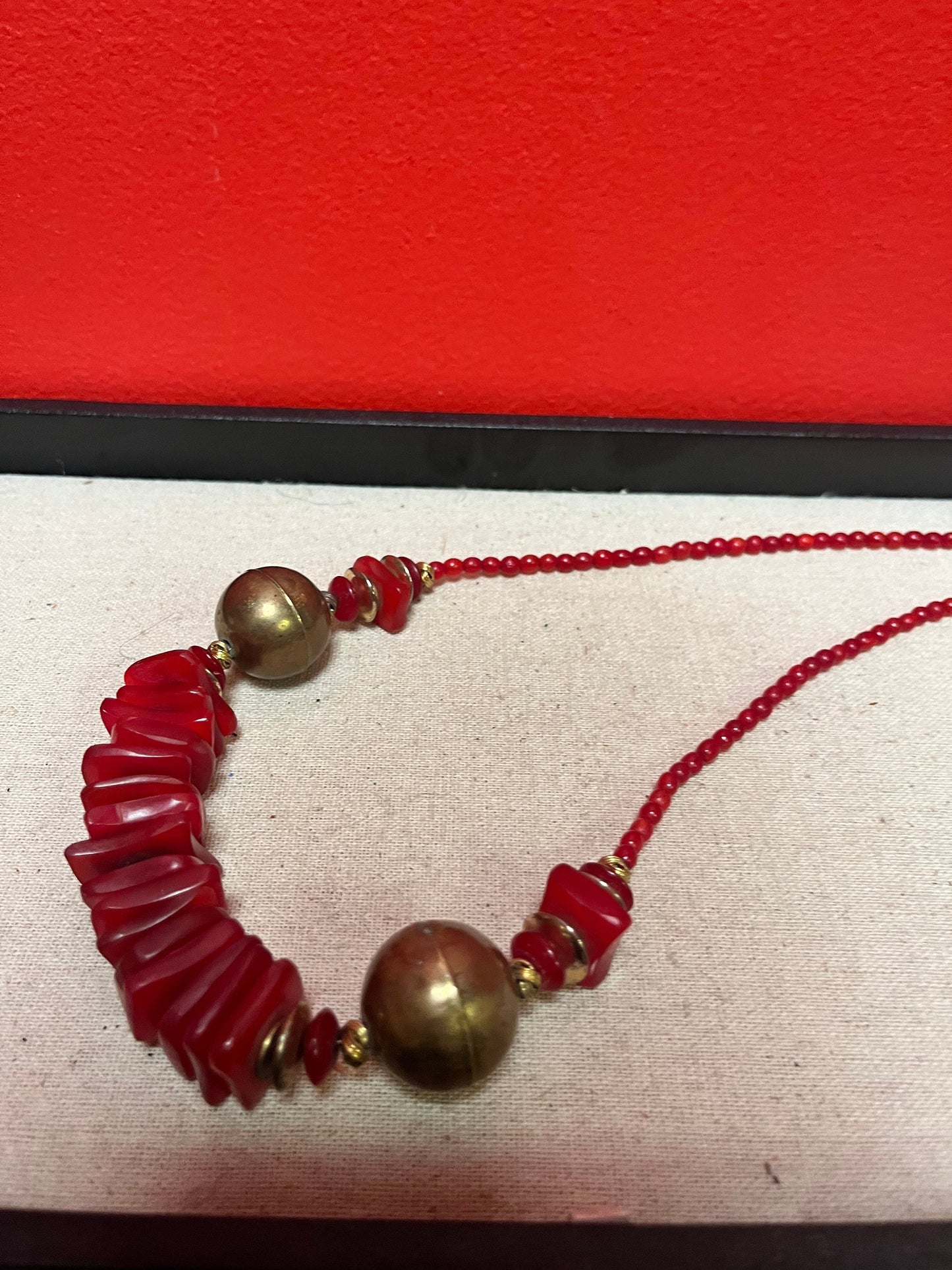 Approximately 22 inch long lucite  and brass necklace  great colour and look