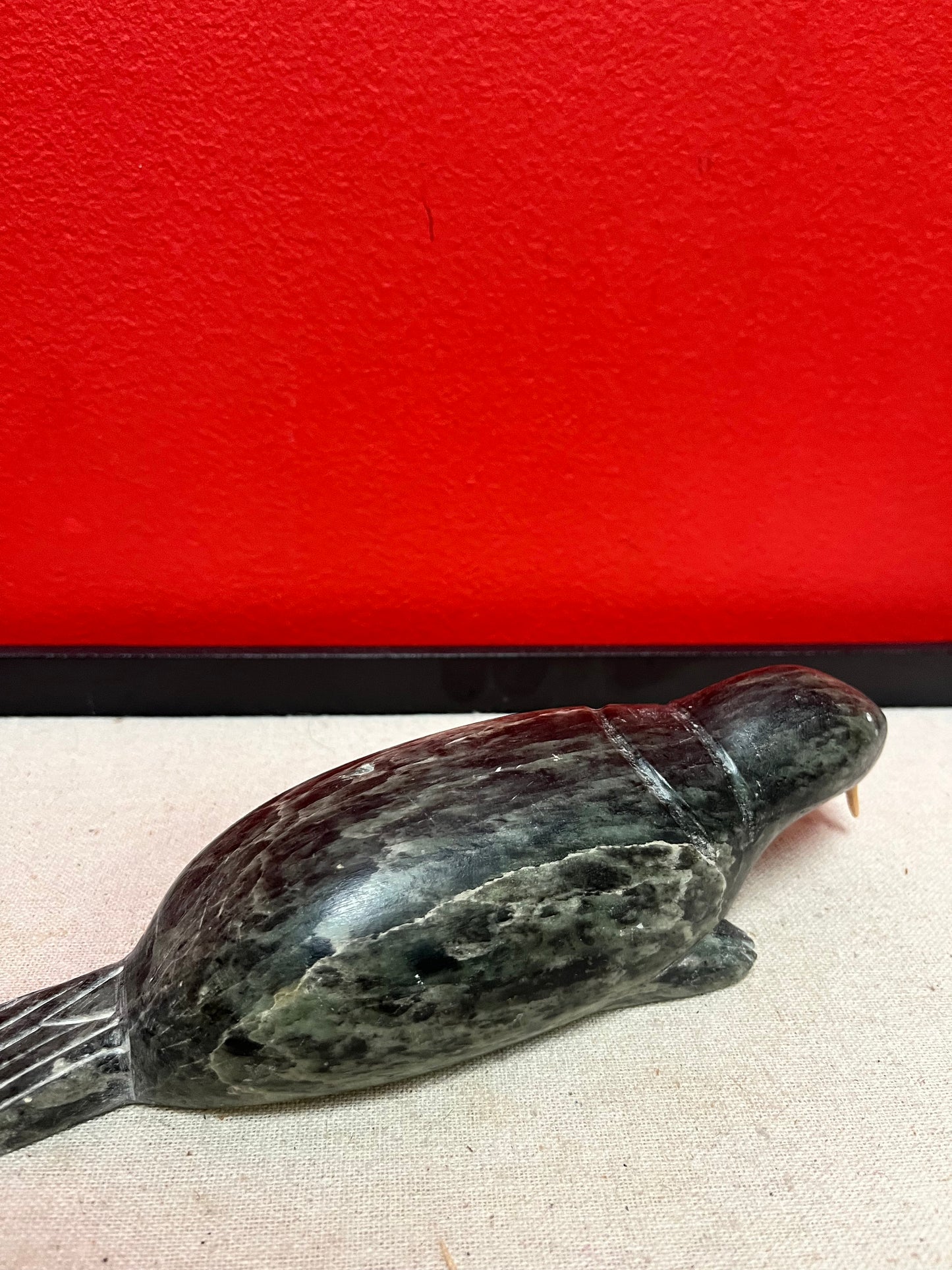 A  Fabulous 8 inch long indigenous Inuit soapstone walrus signed by well-known artist