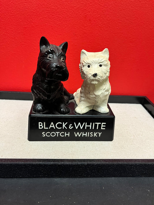 A  Lovely 6 inch tall, black and white Buchanan scotch whiskey Scotty dog plastic store advertising figure