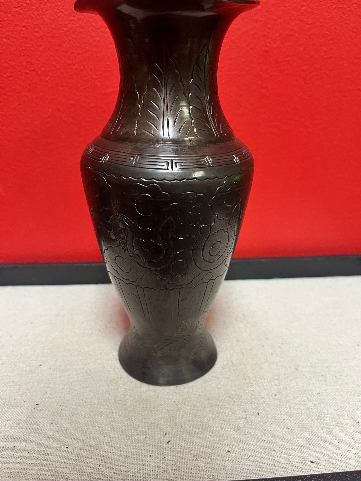 Heavy 8 inch Japanese bronze vase with heavy decoration  slight dent at top  great value
