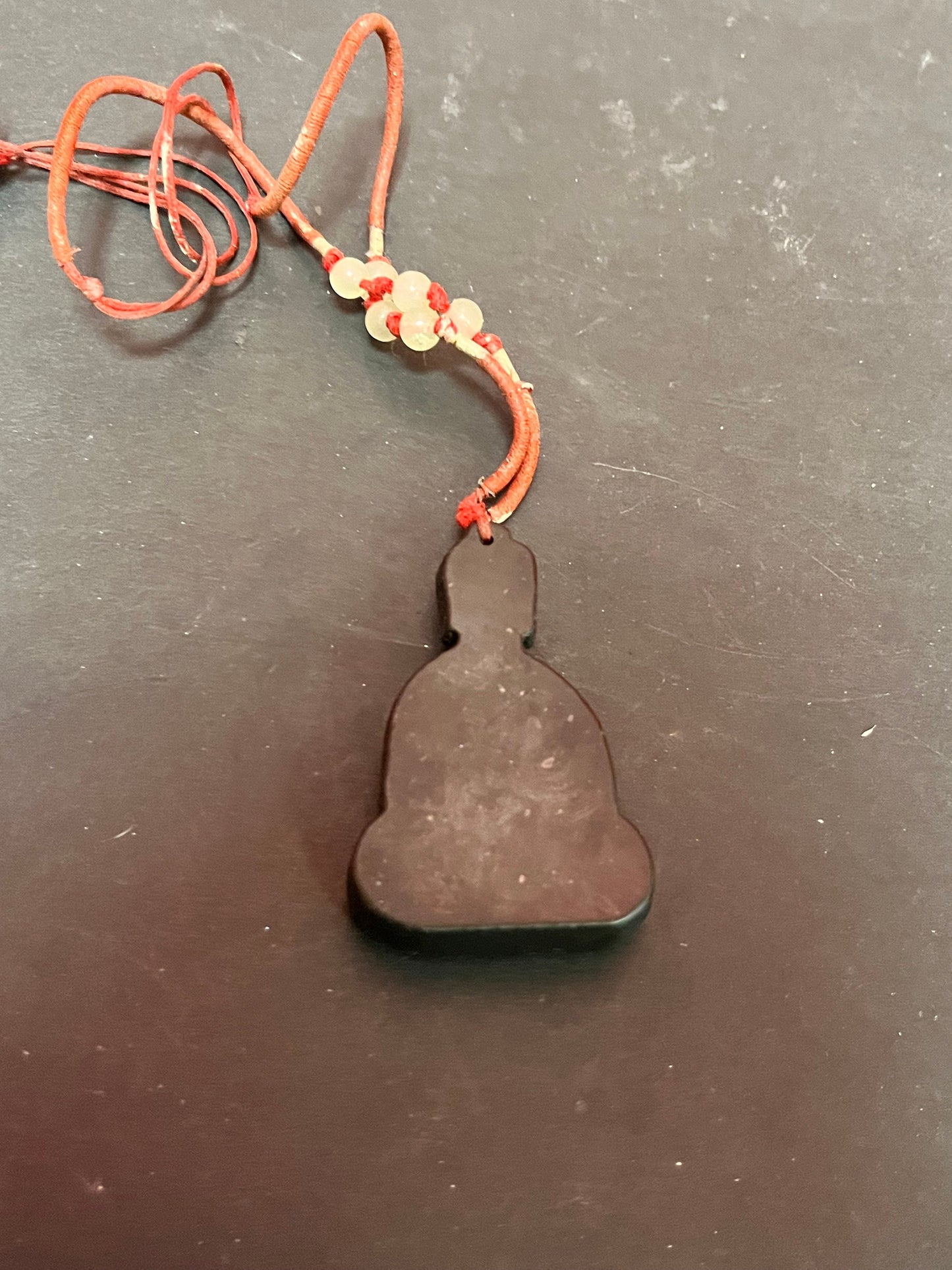2.5 inch long older Asian black stone, Buddha pendant with original necklace   lovely detail