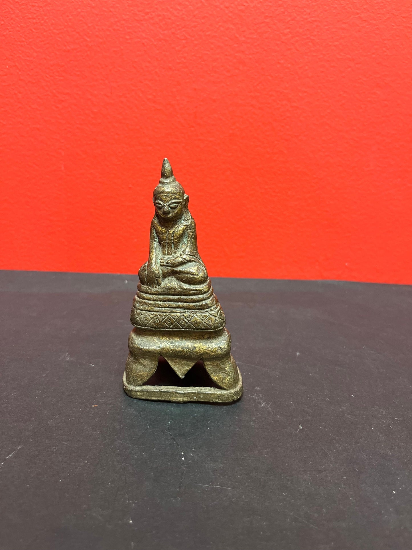 Museum quality ancient 5 inch bronze statue of a Buddha   intense quality and detail