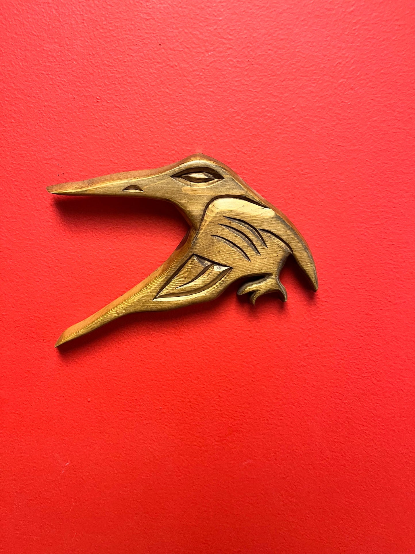 A Lovely detailed 8 inch long indigenous First Nations pacific north west coast signed hummingbird plaque