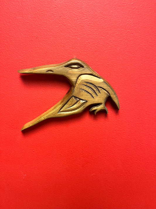 A Lovely detailed 8 inch long indigenous First Nations pacific north west coast signed hummingbird plaque