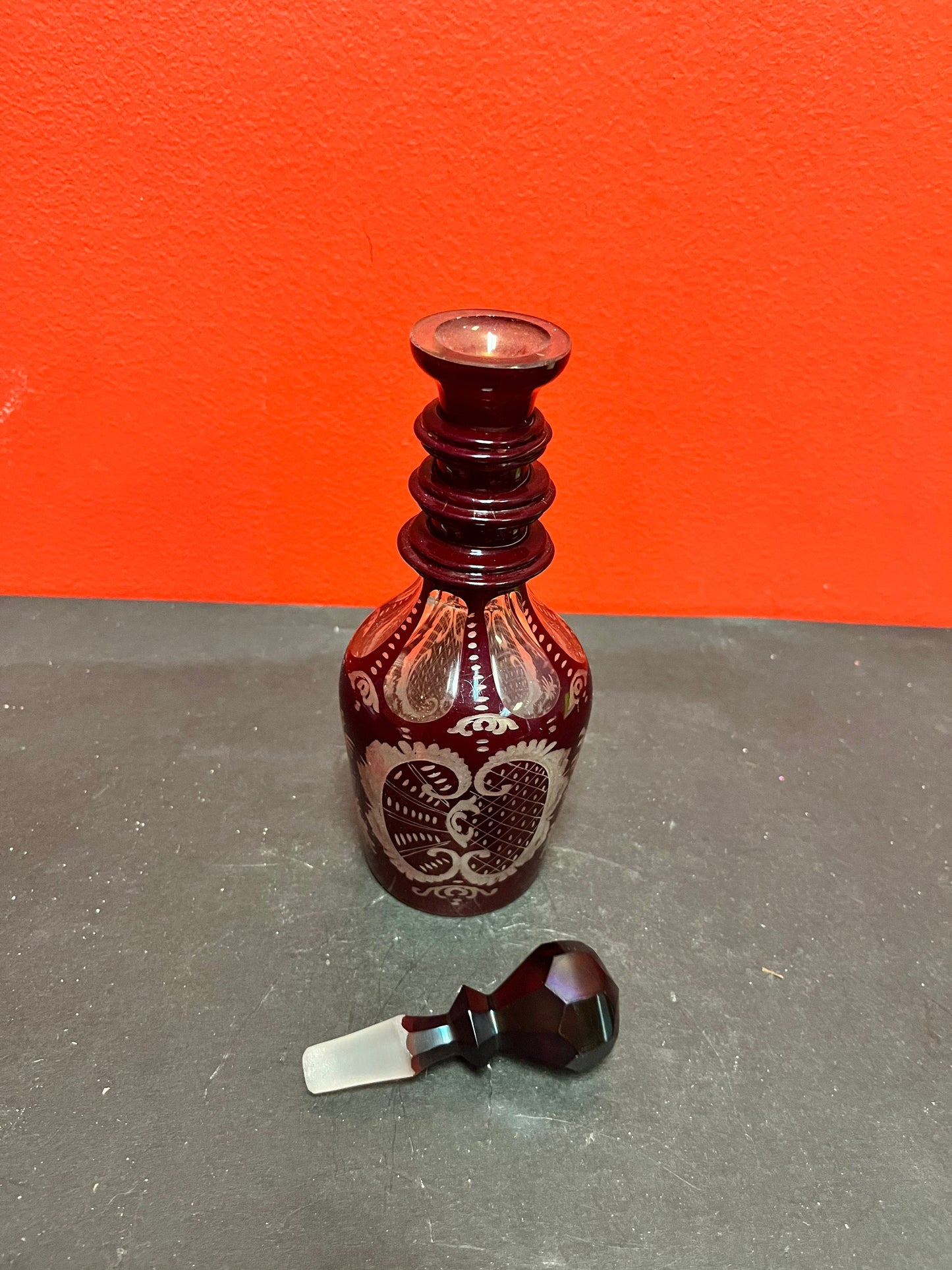 9 inch tall beautiful antique ruby etched, crystal decanter  Wonderful condition and quality