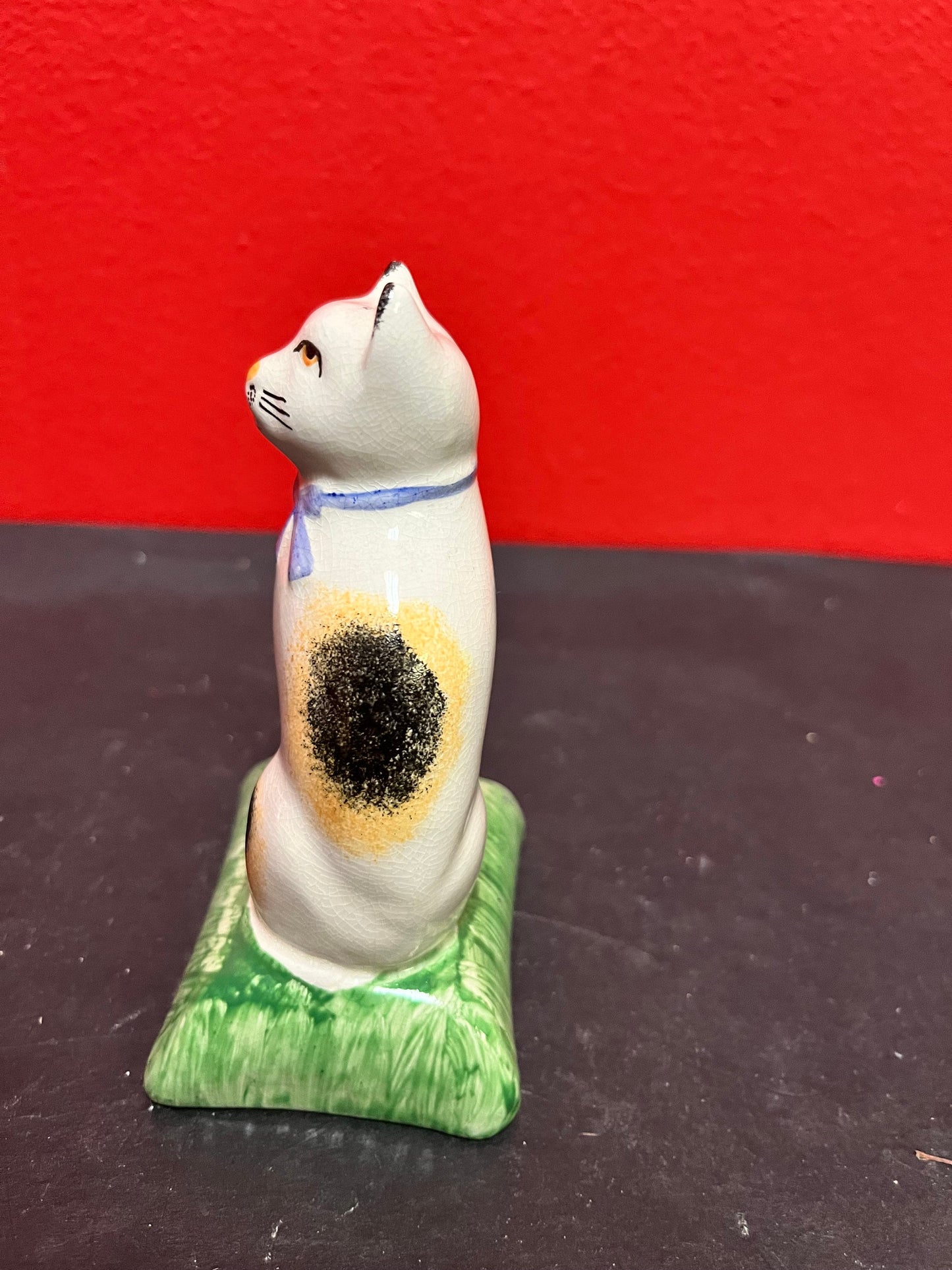 Lovely antique 4 inch high English Staffordshire cat on pillow