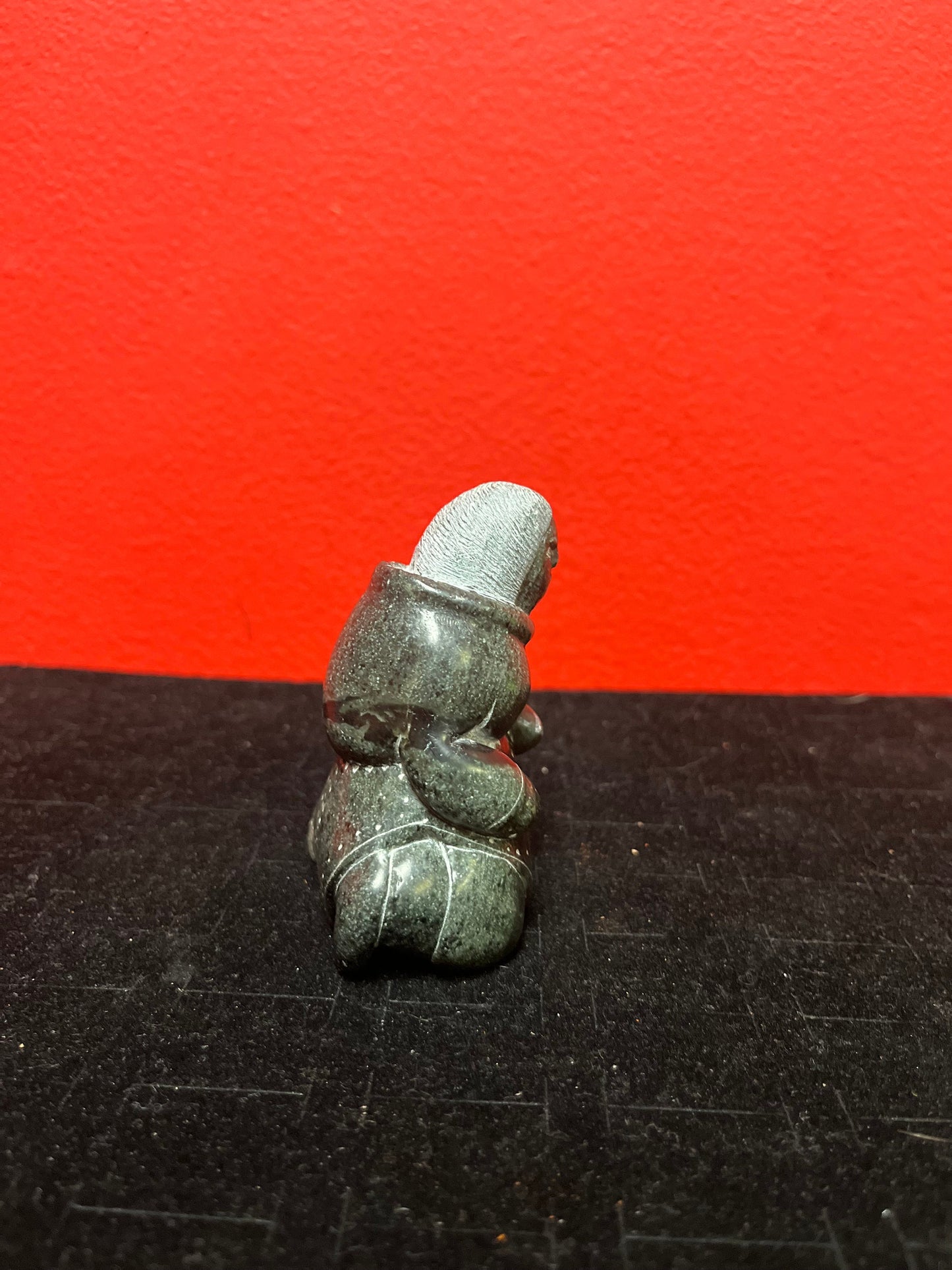 Exquisite museum quality  signed 3 inch tall antique, female artist indigenous  Inuit statue of a woman  intense quality and detail