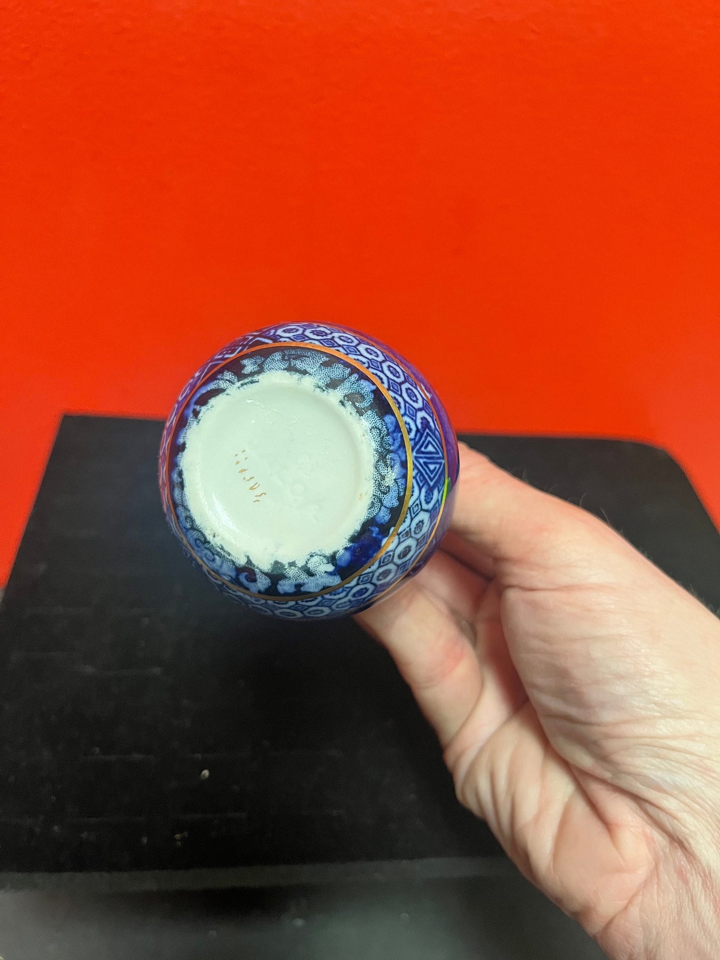 Lovely 4 inch Asian blue and gold vase   small and beautiful and in perfect  condition