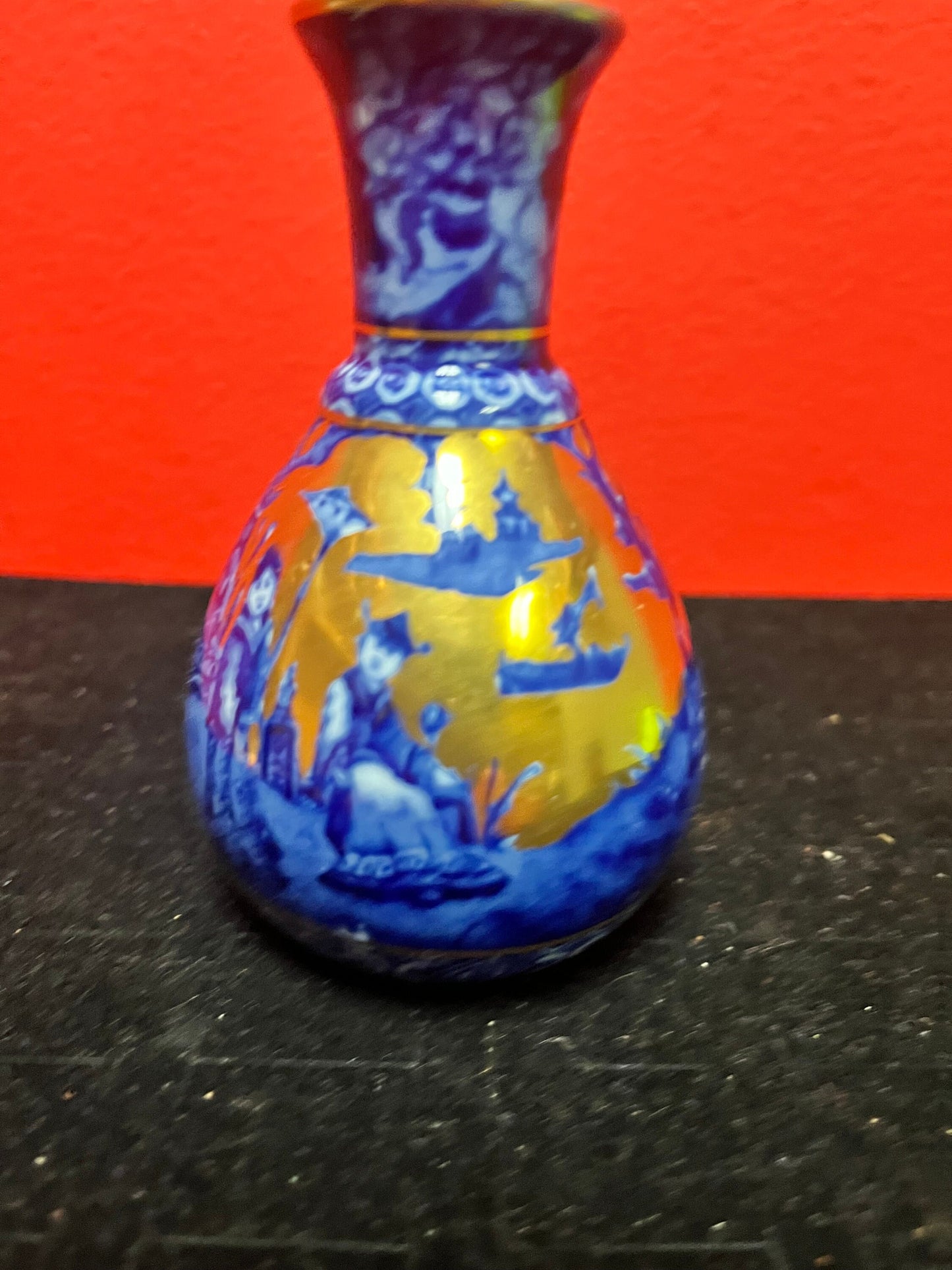 Lovely 4 inch Asian blue and gold vase   small and beautiful and in perfect  condition