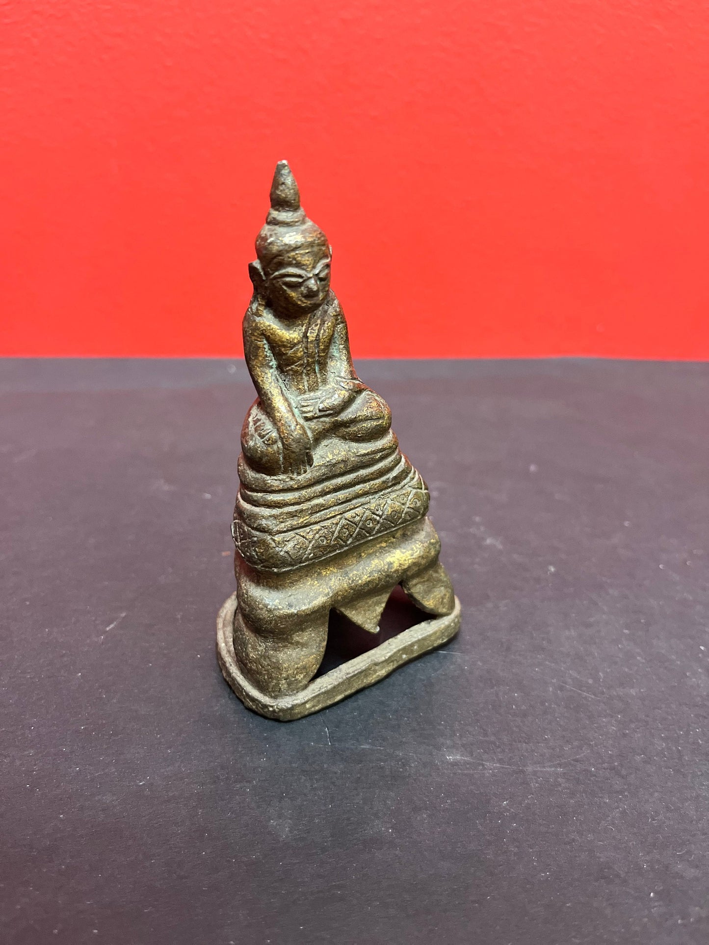 Museum quality ancient 5 inch bronze statue of a Buddha   intense quality and detail