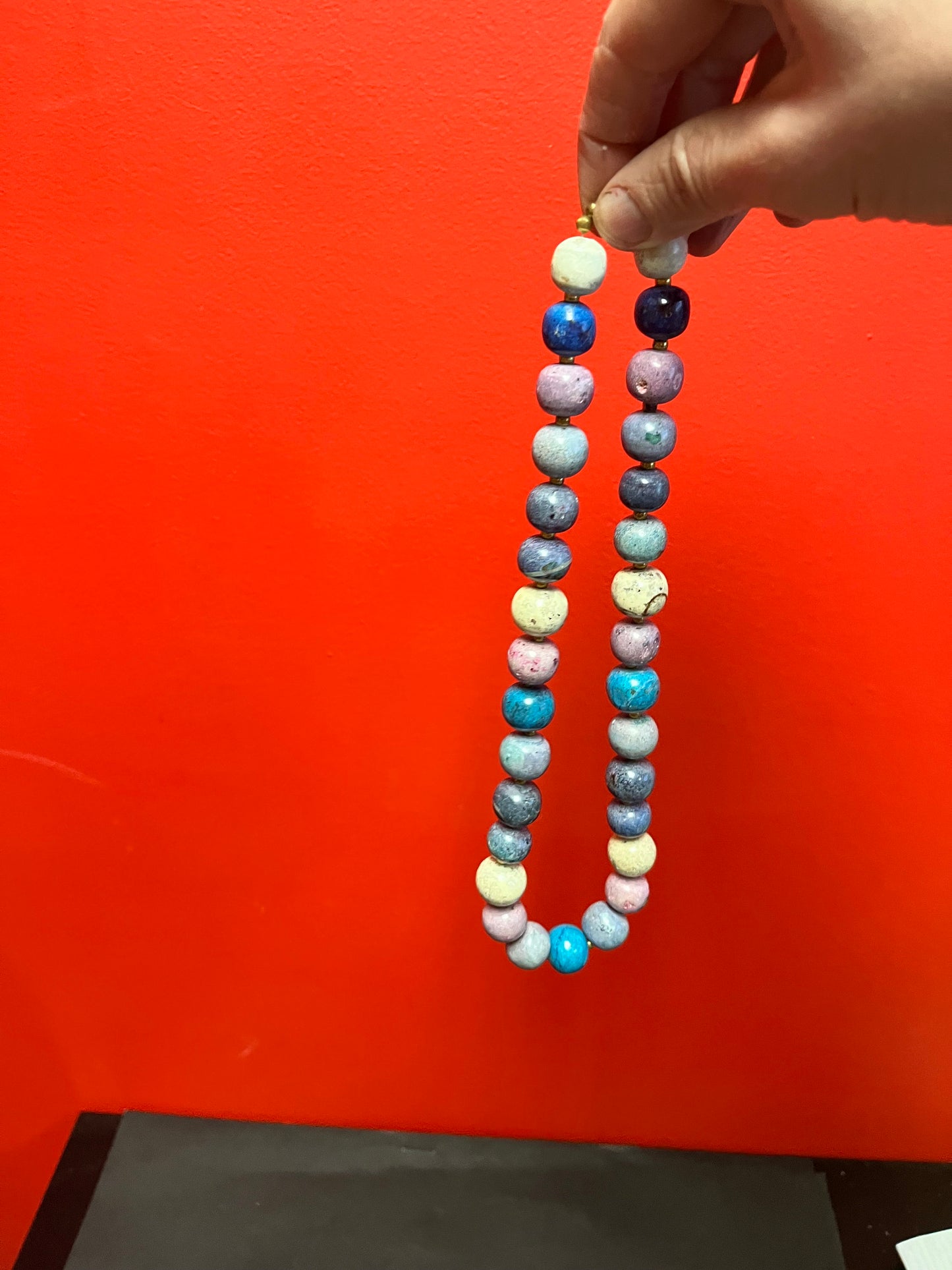 Approx 22 inches stone necklace  cool design.  great quality