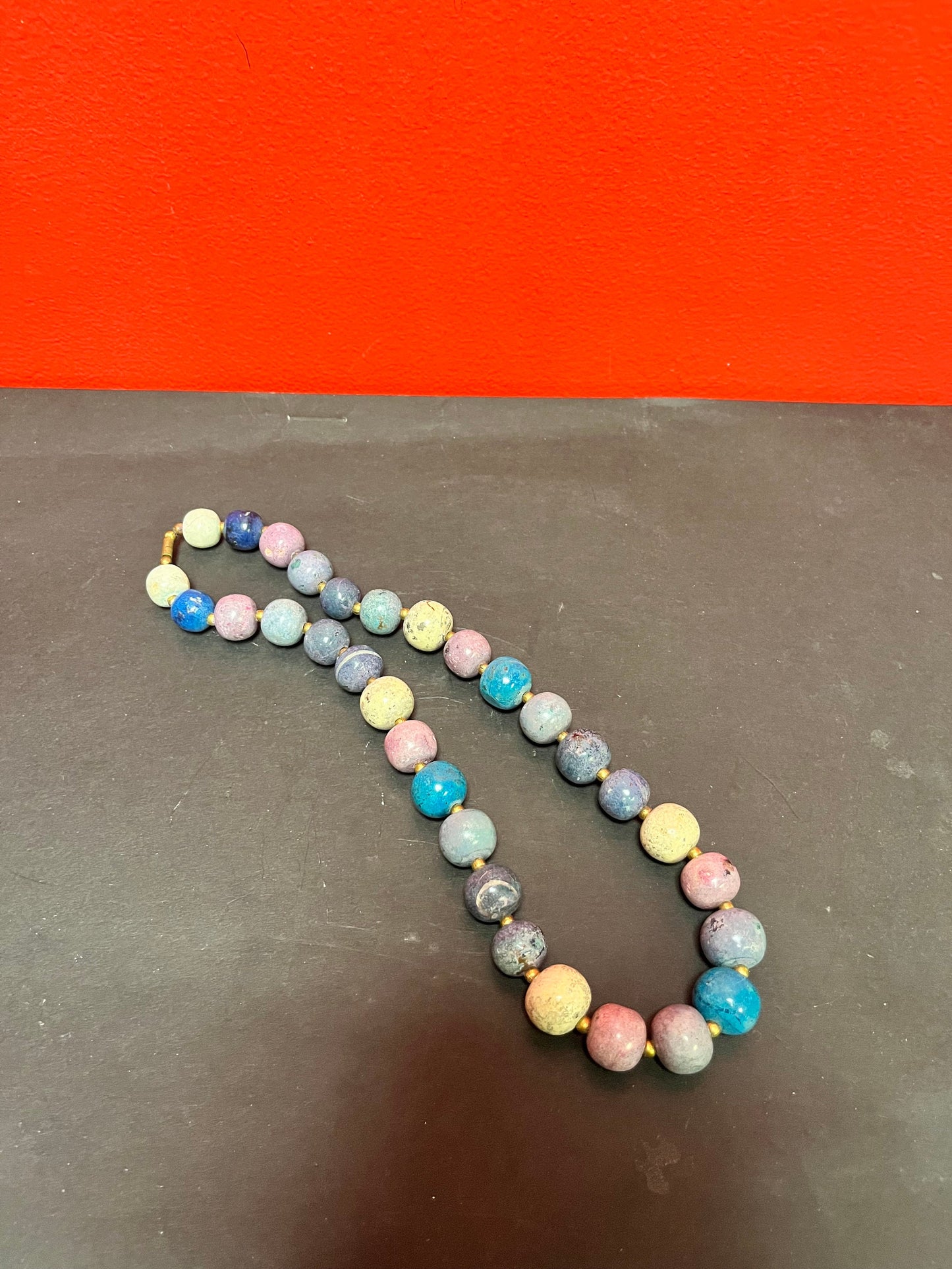 Approx 22 inches stone necklace  cool design.  great quality