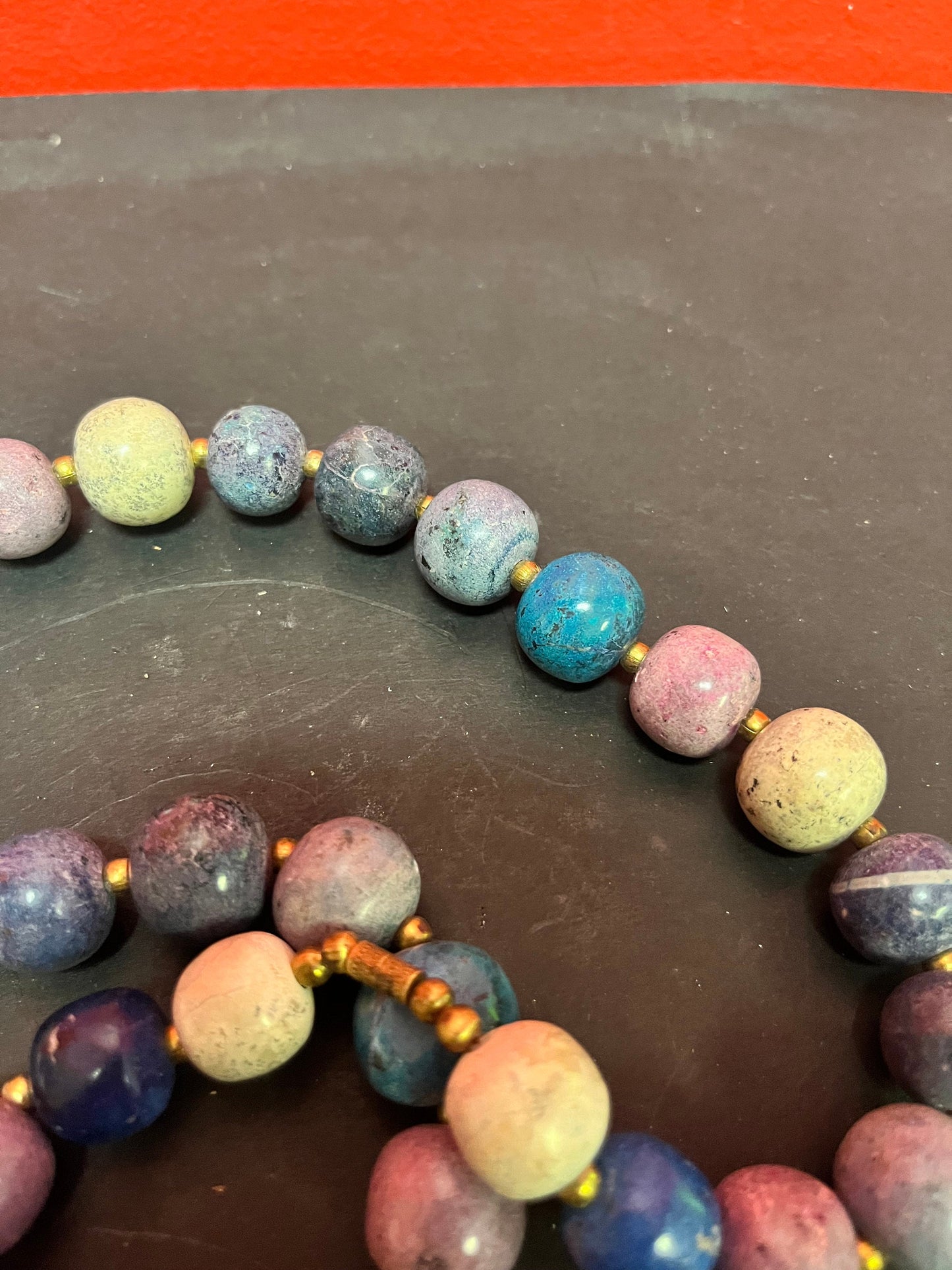 Approx 22 inches stone necklace  cool design.  great quality