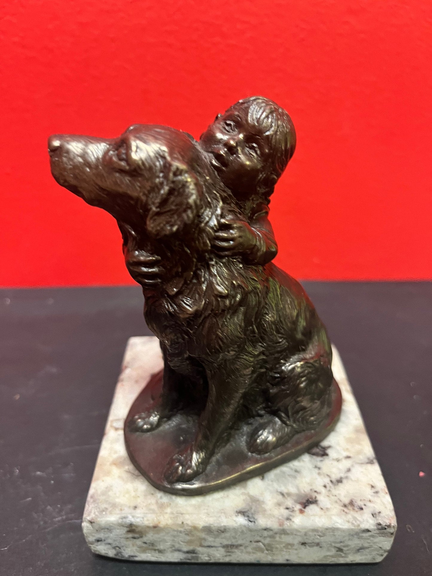 Lovely 5 inch high bronze statue of a child with dog on marble stand   lovely detail and quality  value priced