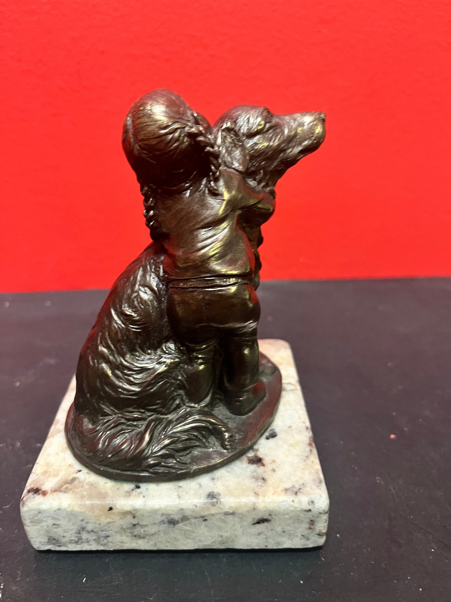 Lovely 5 inch high bronze statue of a child with dog on marble stand   lovely detail and quality  value priced