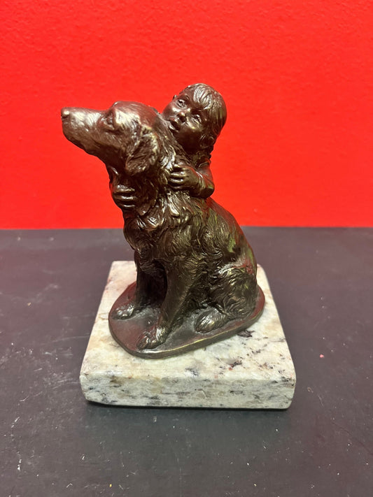 Lovely 5 inch high bronze statue of a child with dog on marble stand   lovely detail and quality  value priced