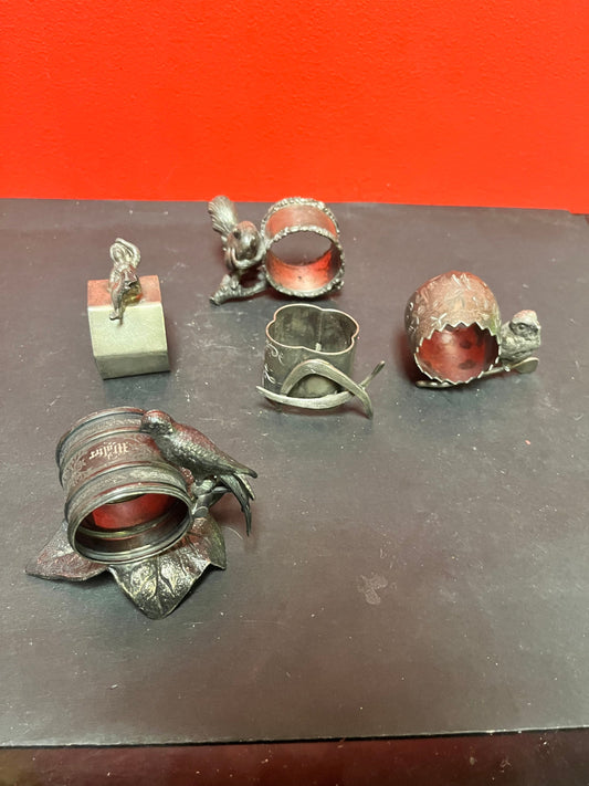 Lovely small collection of five English silver plated figural napkin rings   great value for a great lot