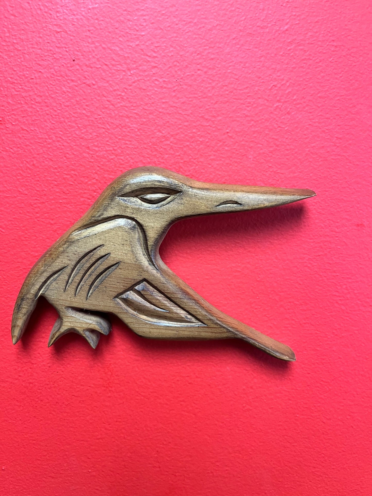 A Lovely detailed 8 inch long indigenous First Nations pacific north west coast signed hummingbird plaque