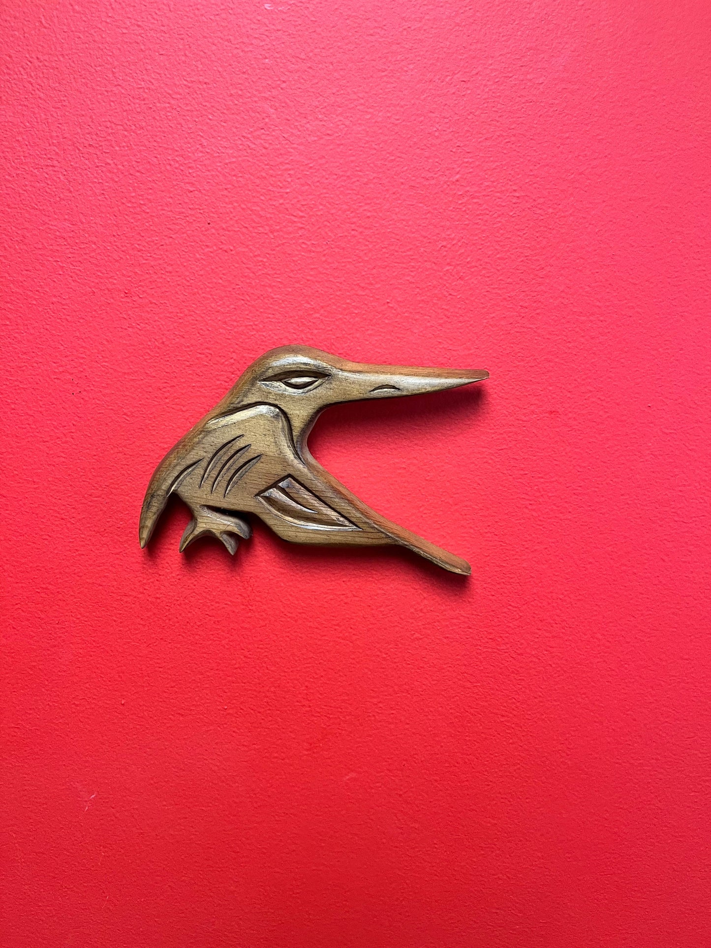 A Lovely detailed 8 inch long indigenous First Nations pacific north west coast signed hummingbird plaque