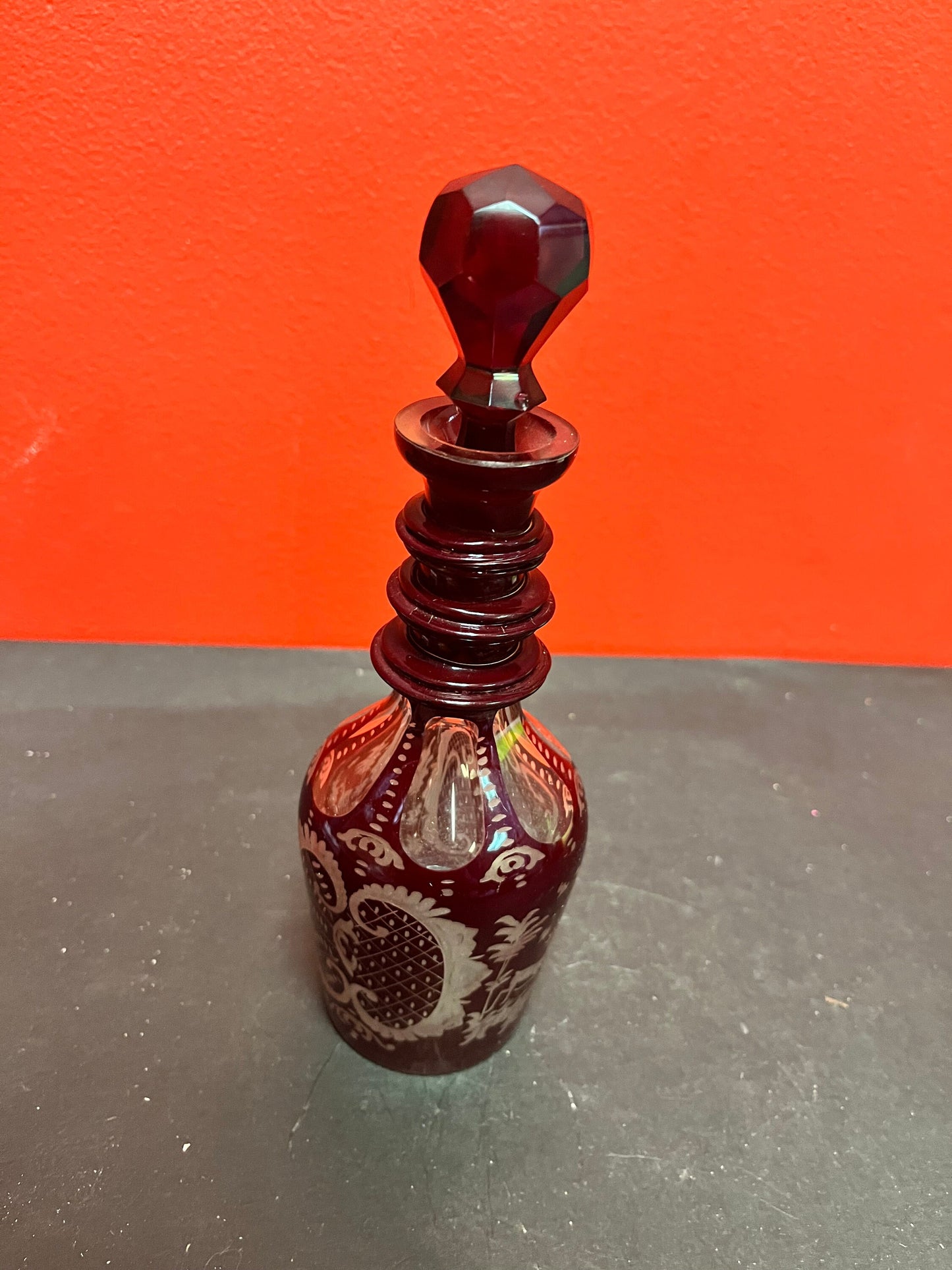 9 inch tall beautiful antique ruby etched, crystal decanter  Wonderful condition and quality