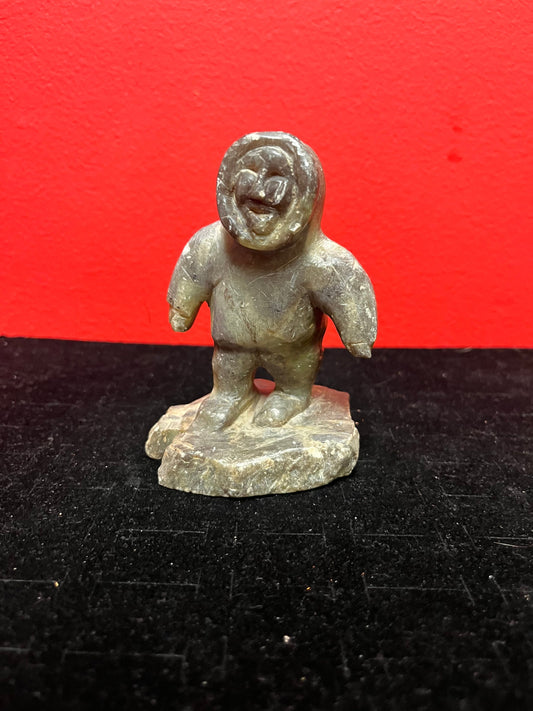 A lovely, 4.5 inch tall, antique indigenous Inuit soapstone statue of a hunter  some minor scratches - signed beauty