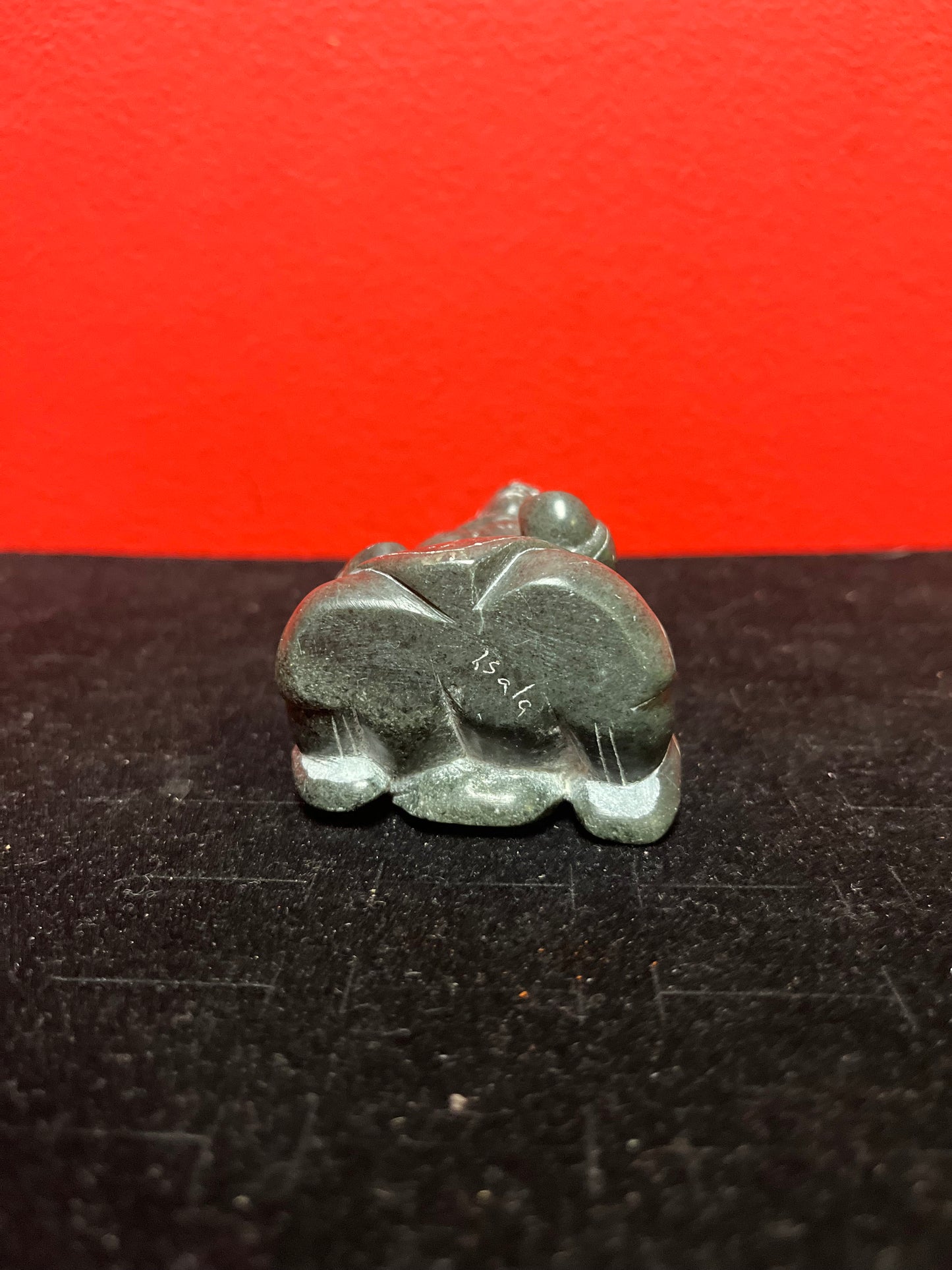 Exquisite museum quality  signed 3 inch tall antique, female artist indigenous  Inuit statue of a woman  intense quality and detail