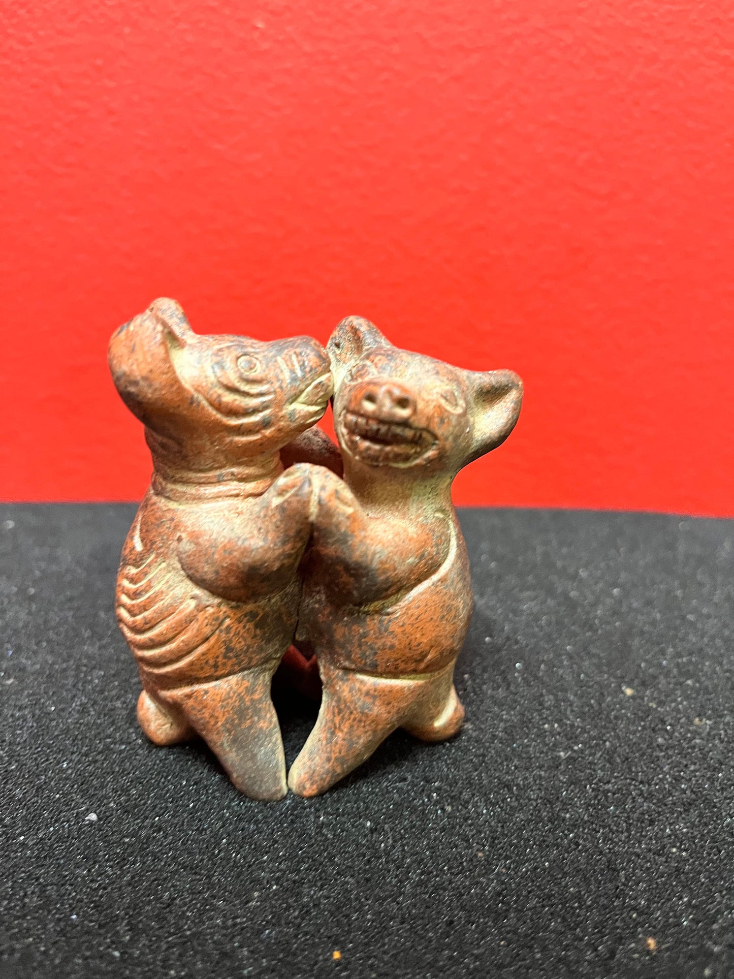 3 inch high vintage Colombian Clay statue of pigs kissing  whimsical statue in perfect condition